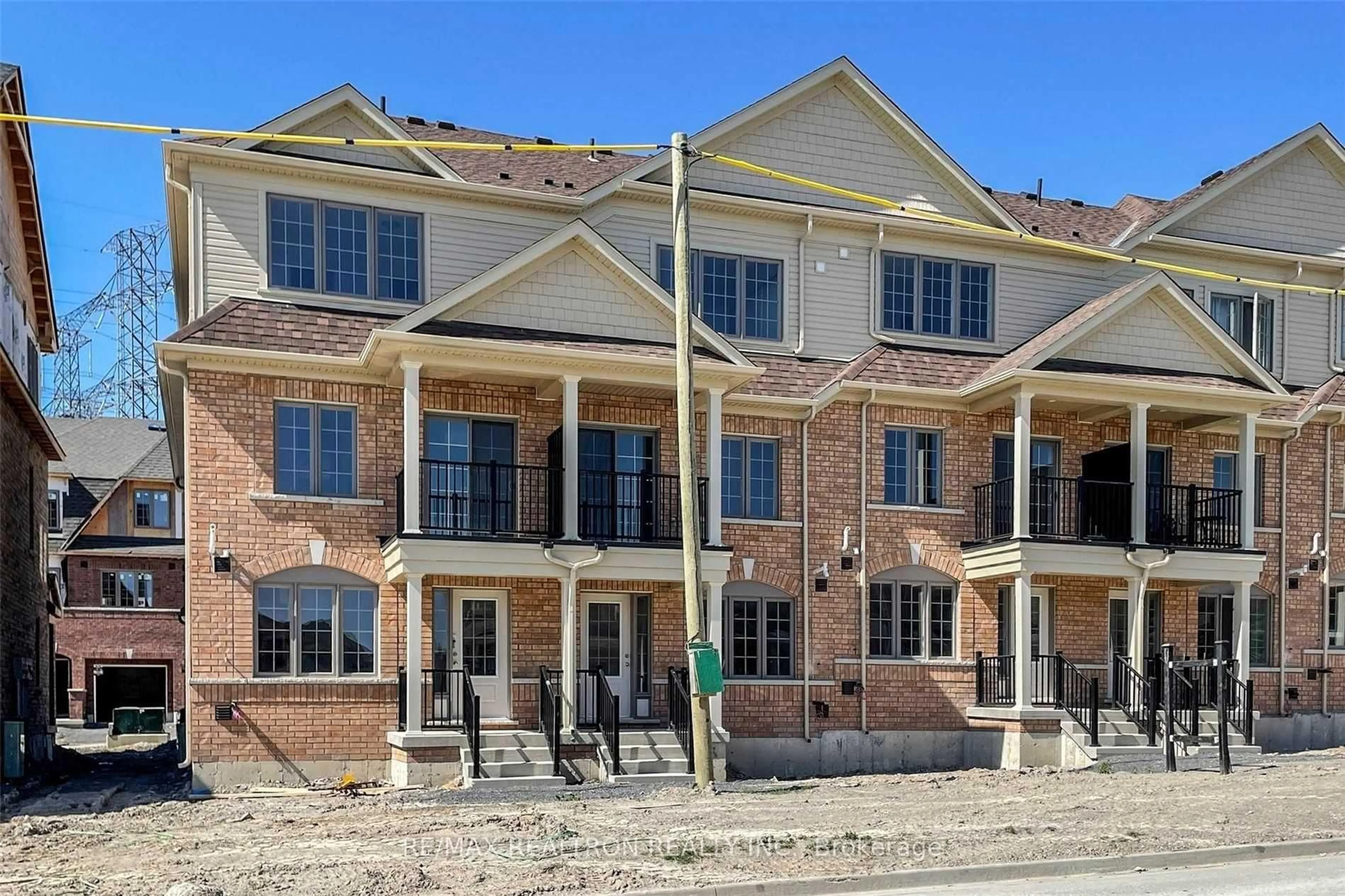 Home with brick exterior material, street for 203 Royal Northern Path #73, Oshawa Ontario L1L 0R6