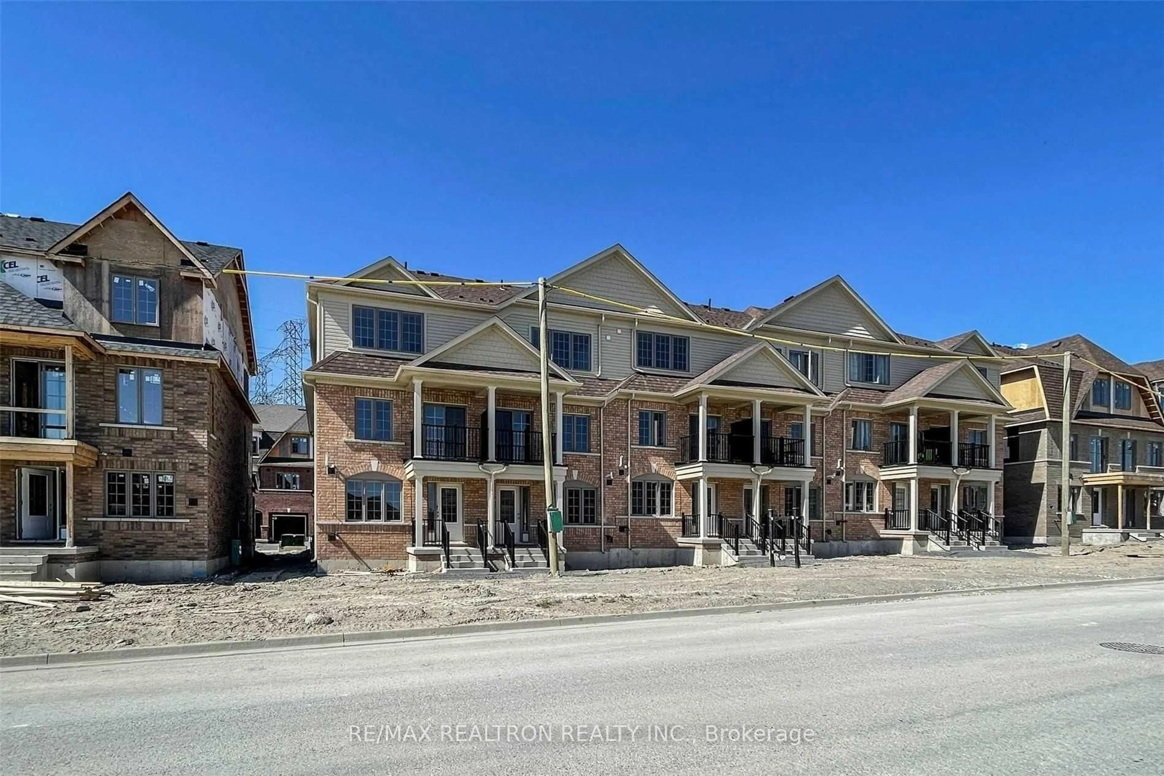 A pic from outside/outdoor area/front of a property/back of a property/a pic from drone, unknown for 203 Royal Northern Path #73, Oshawa Ontario L1L 0R6