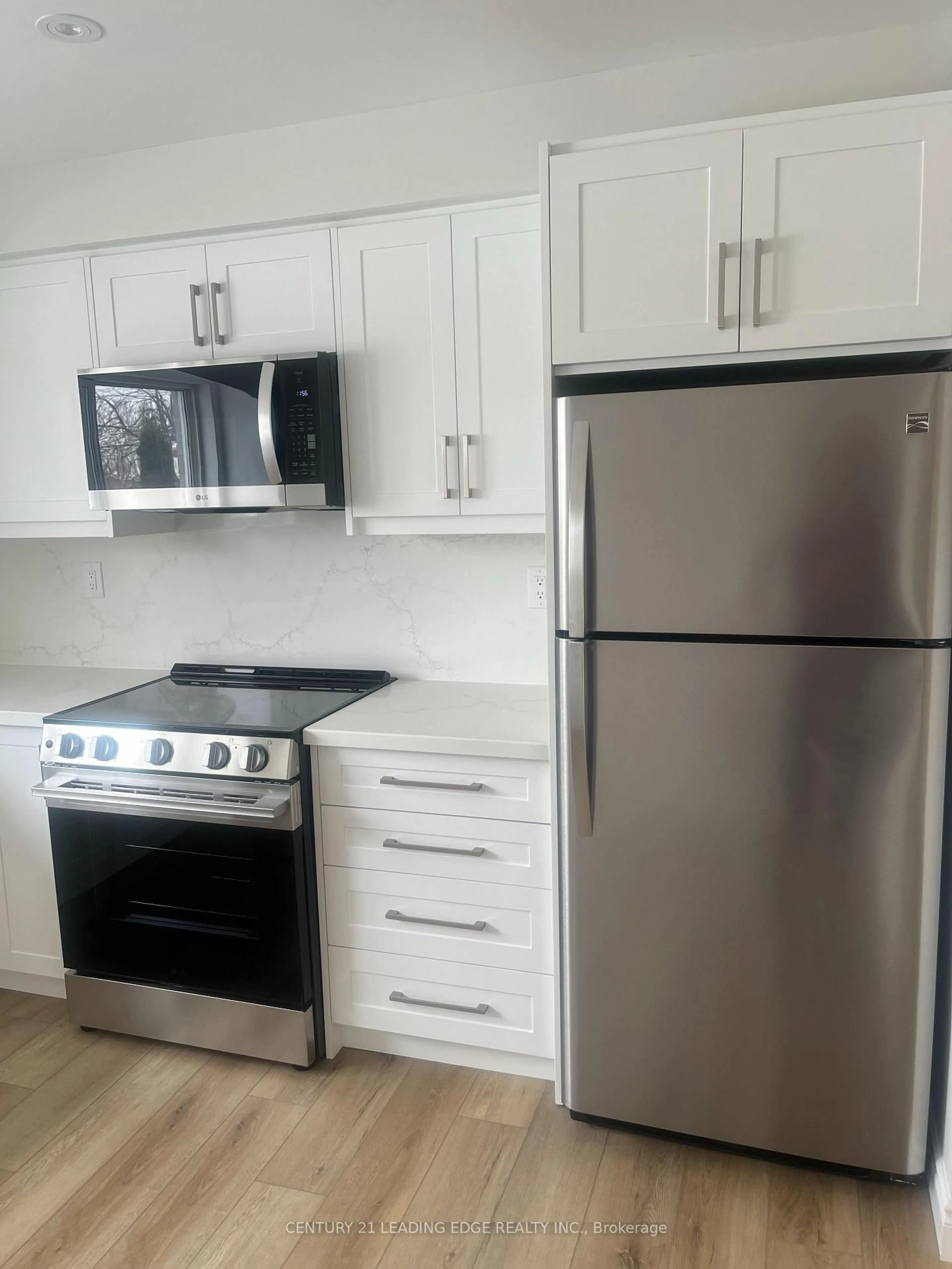 Standard kitchen, wood/laminate floor for 24 King Henrys Blvd, Toronto Ontario M1T 2V4