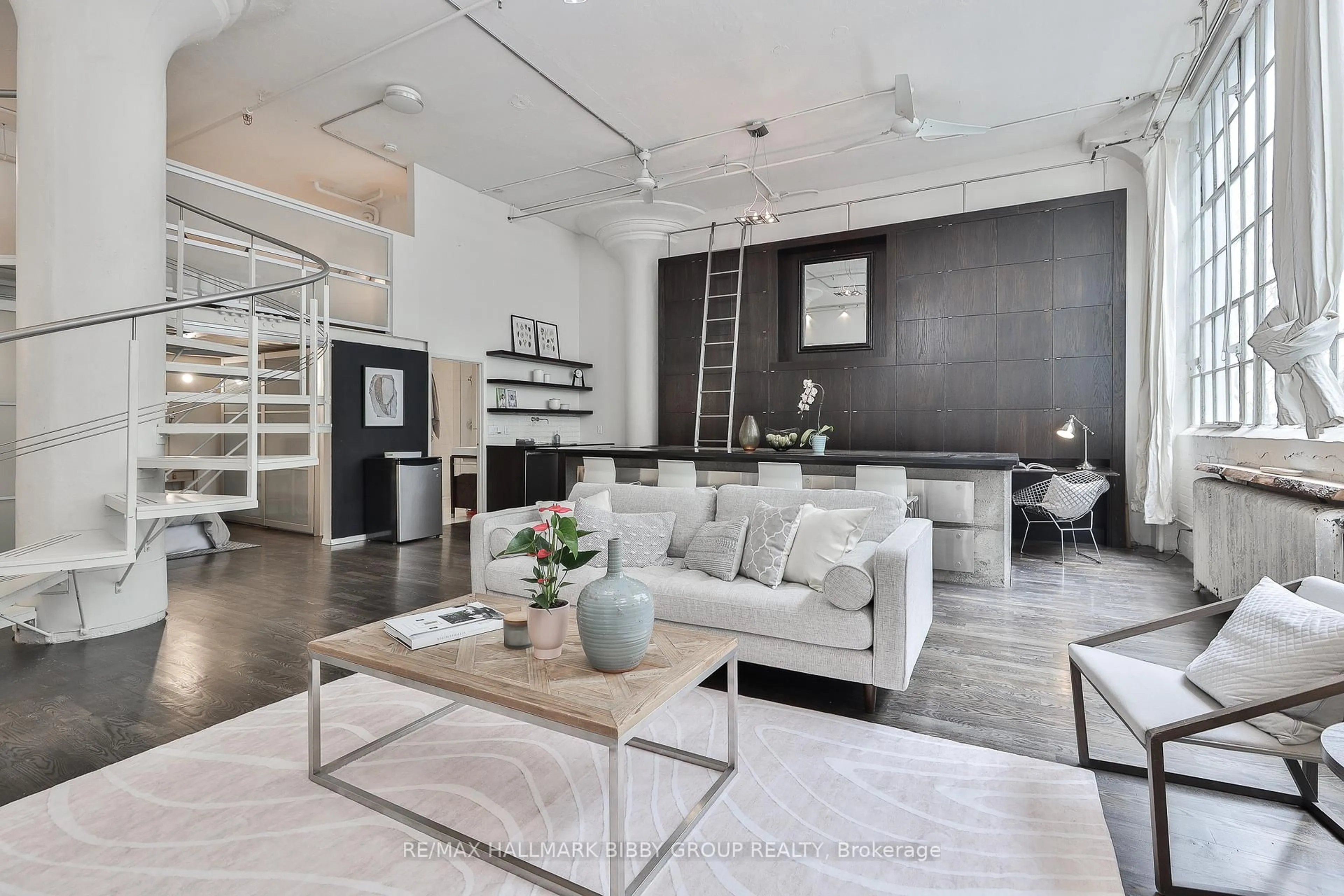 Living room with furniture, unknown for 245 Carlaw Ave #315, Toronto Ontario M4M 2S6