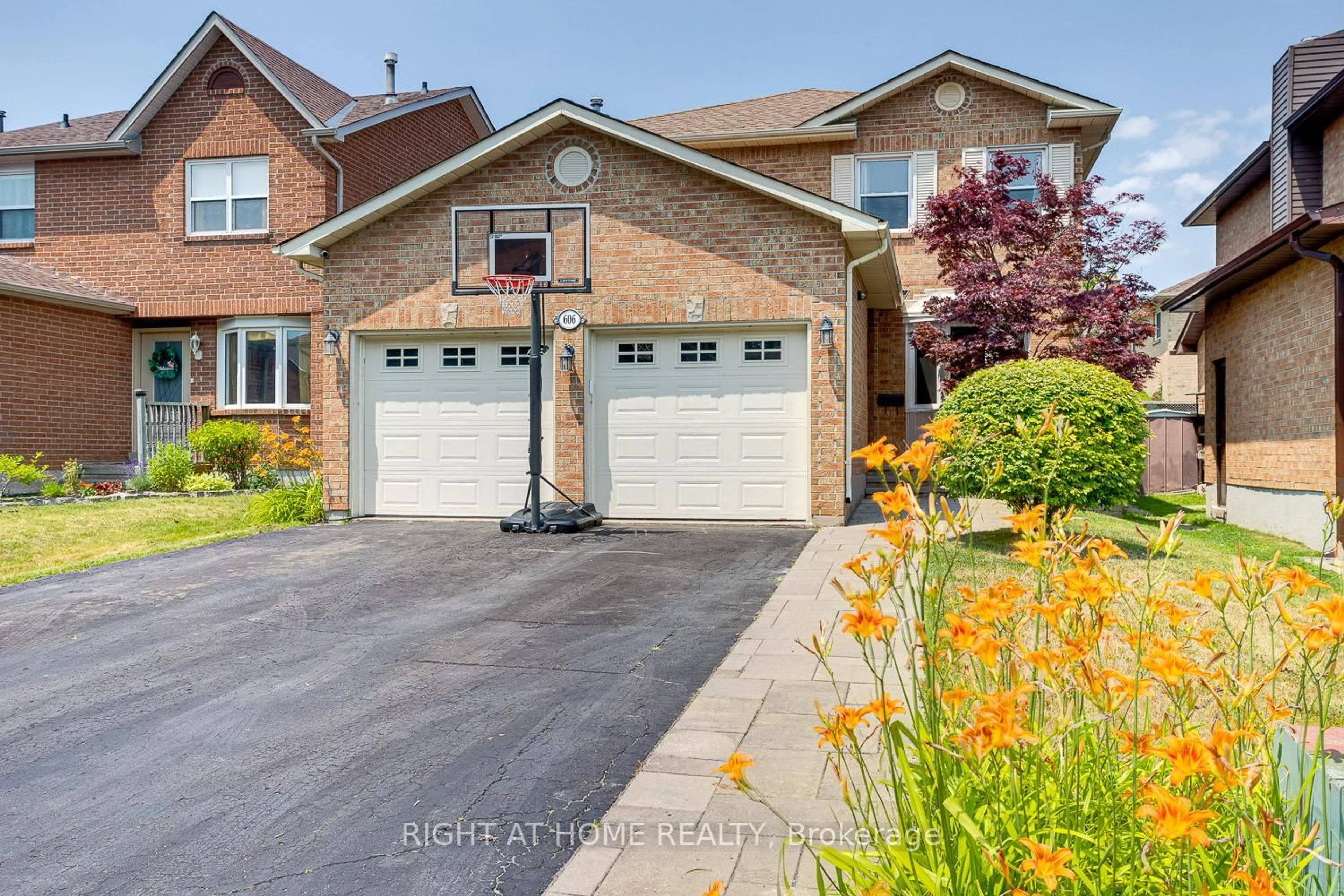 Home with brick exterior material, street for 606 Chiron Cres, Pickering Ontario L1V 4T5