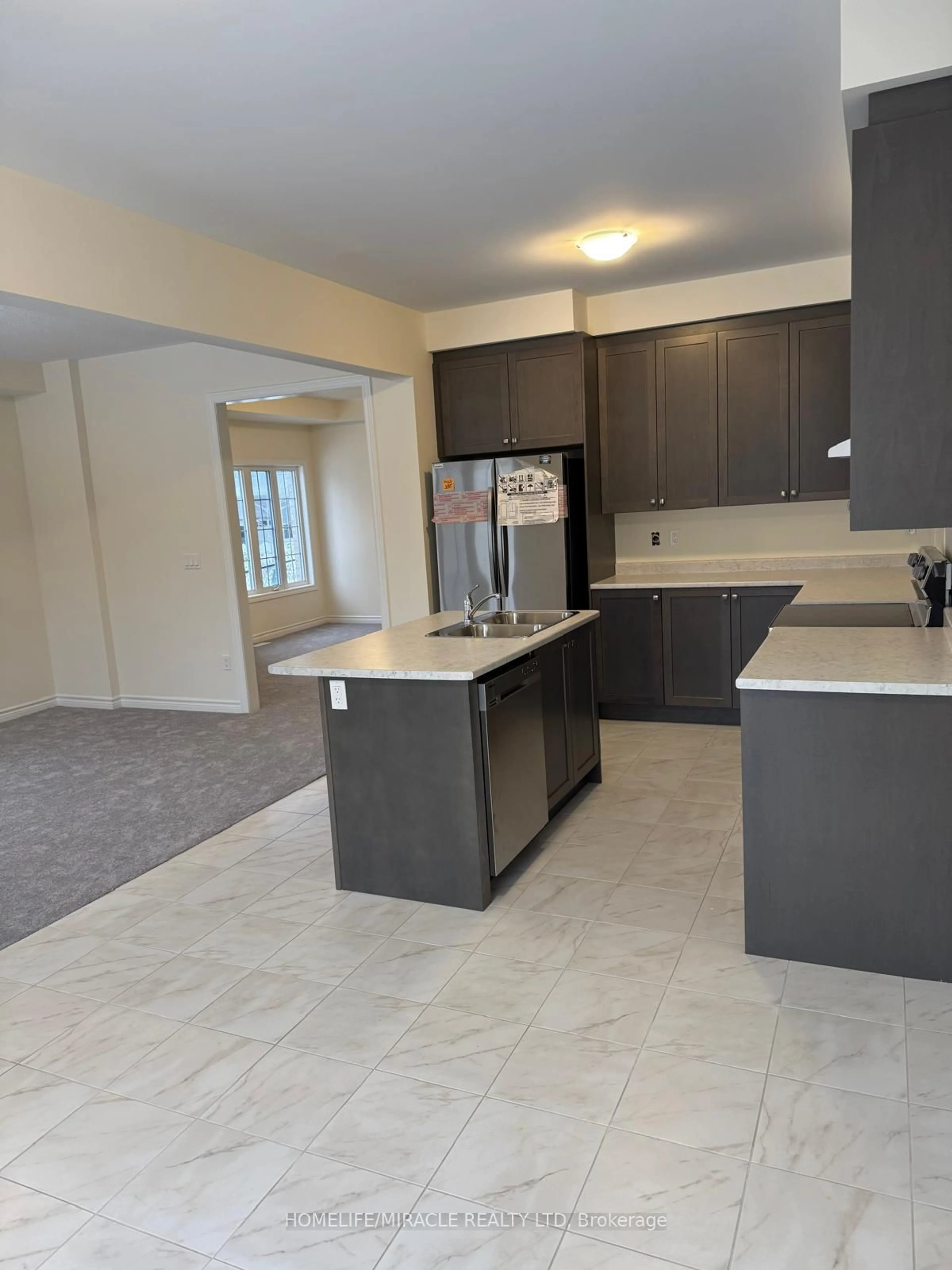 Open concept kitchen, unknown for 57 North Garden Blvd, Scugog Ontario L0L 0L0