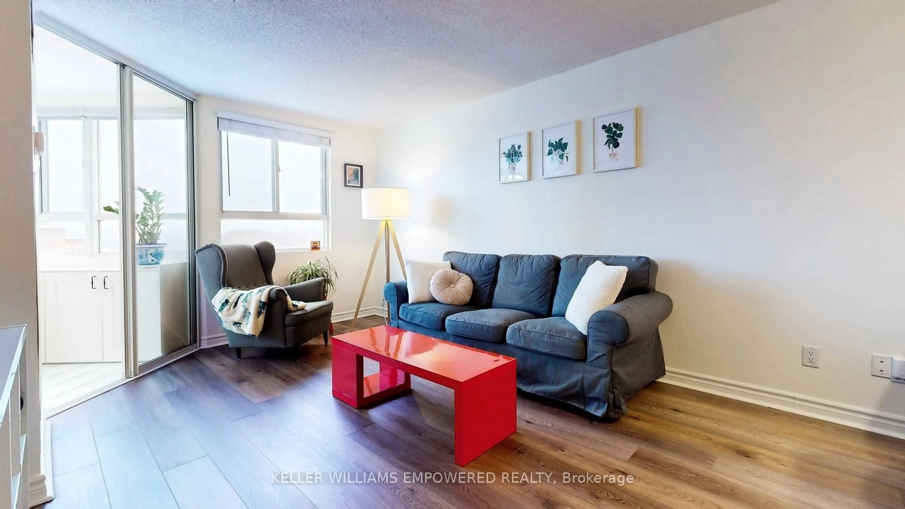 Living room with furniture, wood/laminate floor for 4 Park Vista Cres #1403, Toronto Ontario M4B 3M8