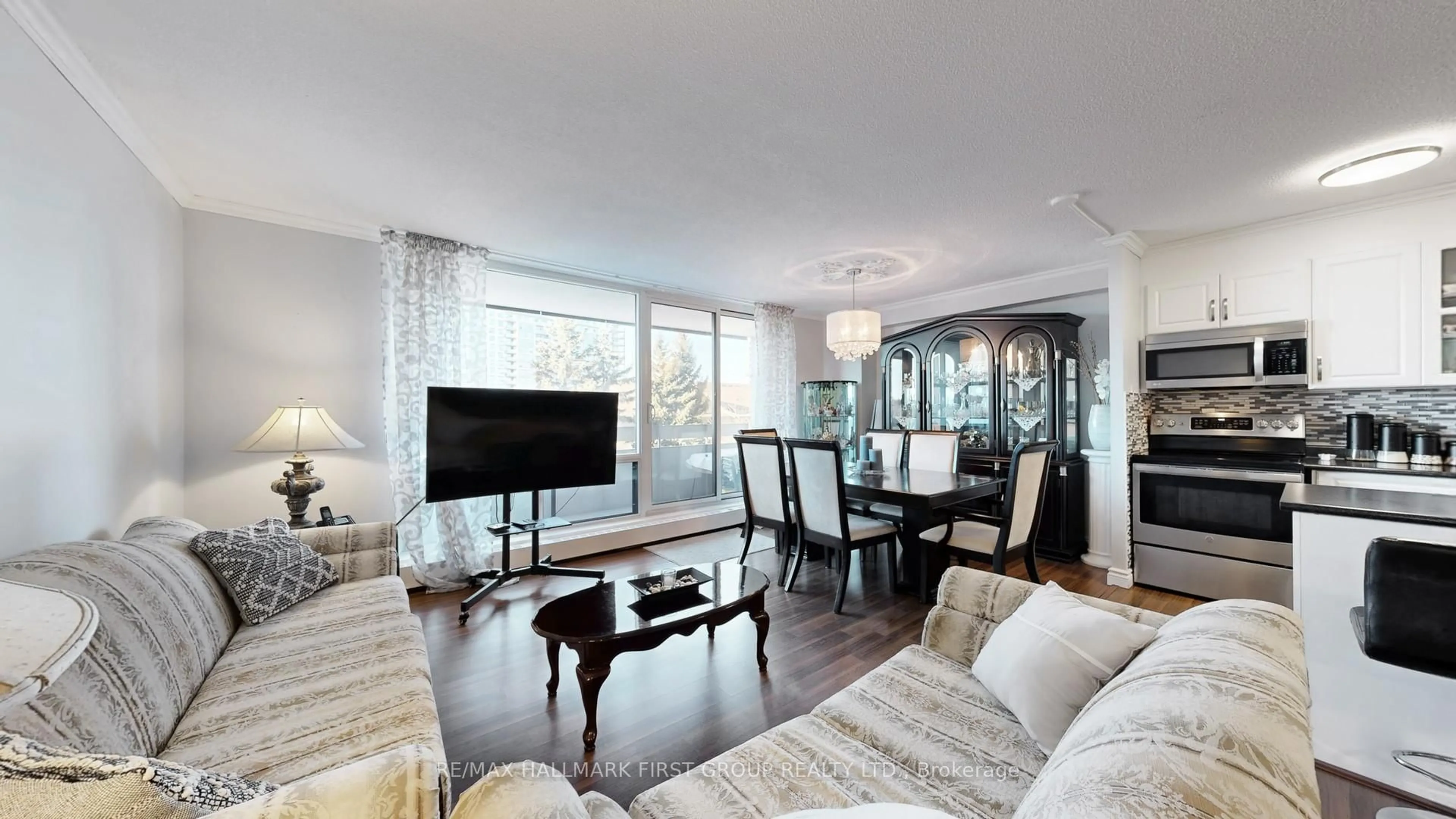 Living room with furniture, wood/laminate floor for 1210 Radom St #509, Pickering Ontario L1W 2Z3