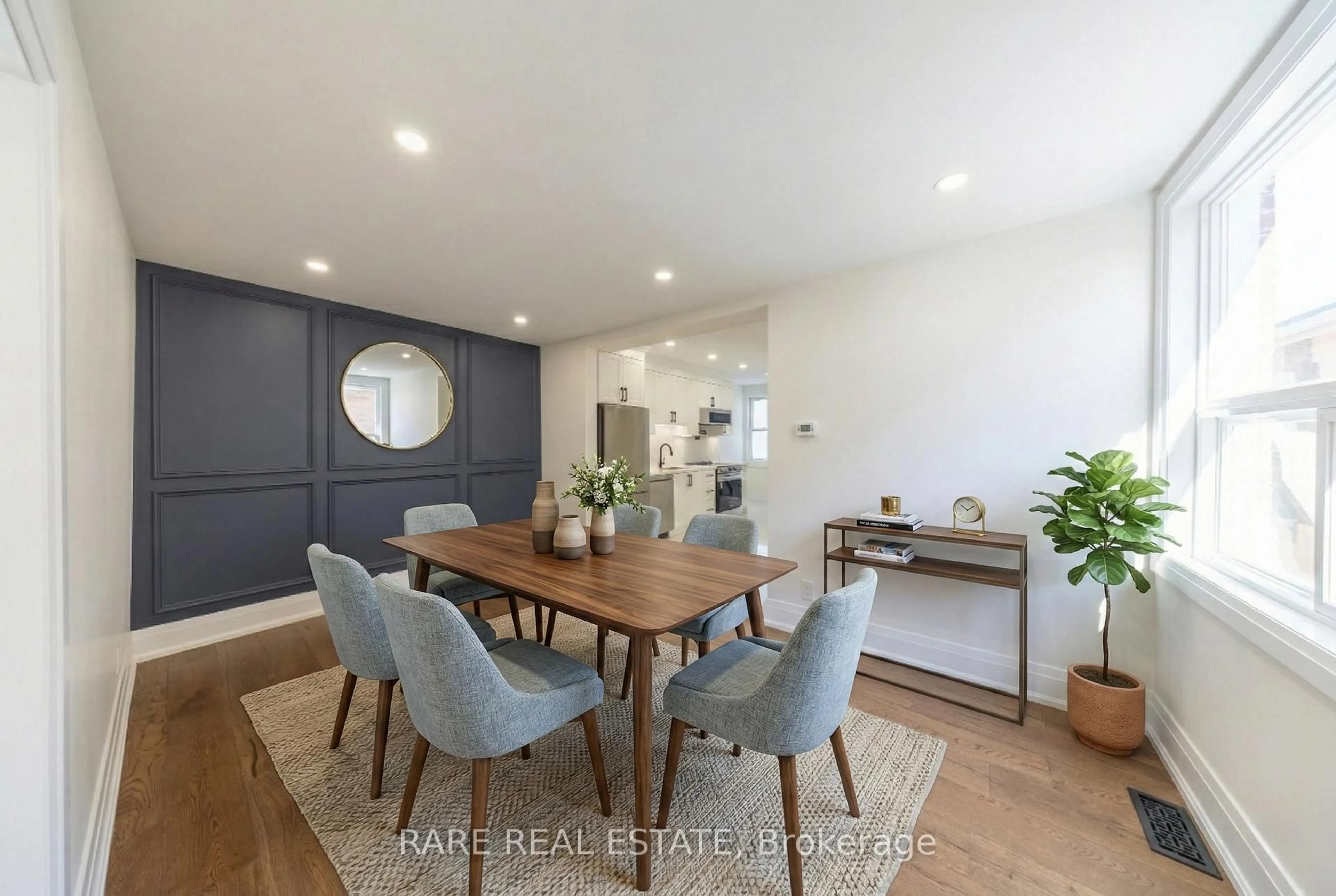 Dining room, wood/laminate floor for 180 Swanwick Ave, Toronto Ontario M4E 2A6