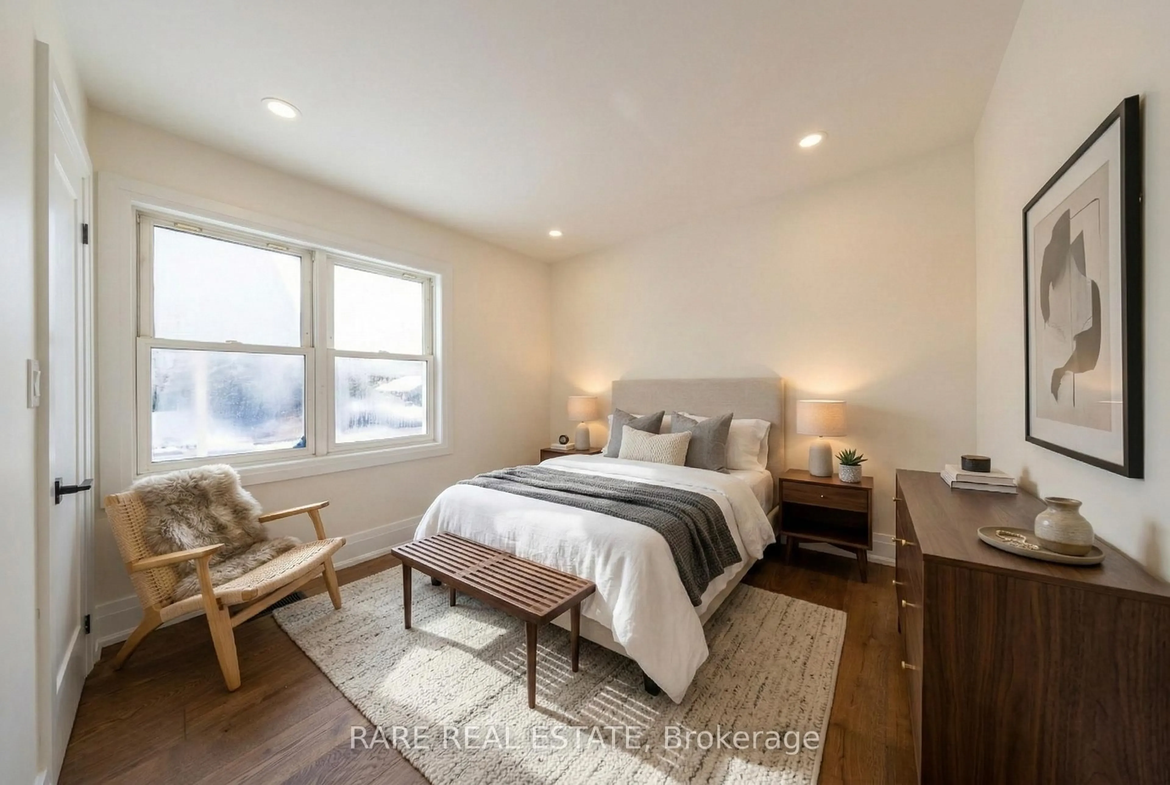Bedroom with bed, wood/laminate floor for 180 Swanwick Ave, Toronto Ontario M4E 2A6