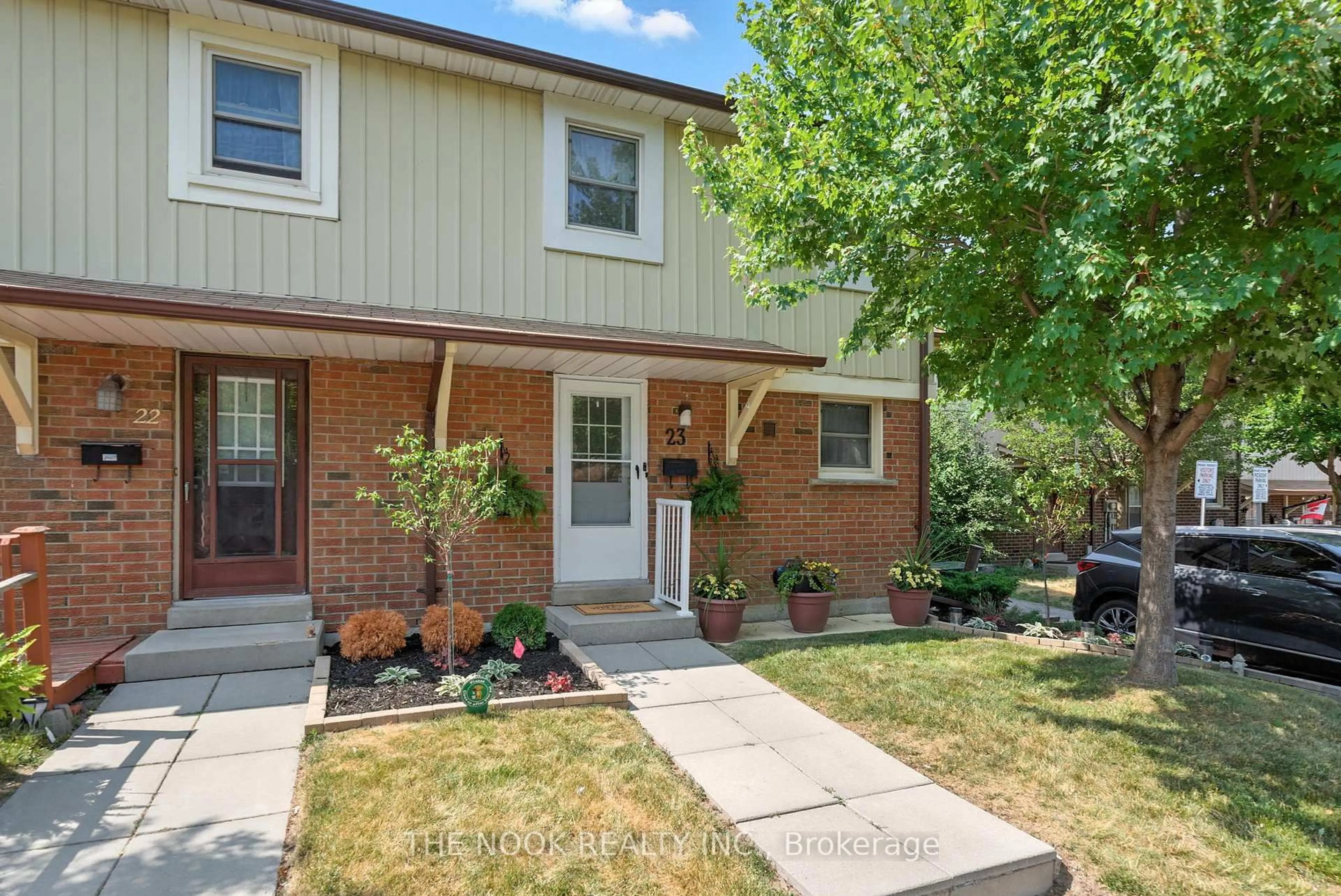 Home with brick exterior material, street for 450 Bristol Cres #23, Oshawa Ontario L1J 6M3