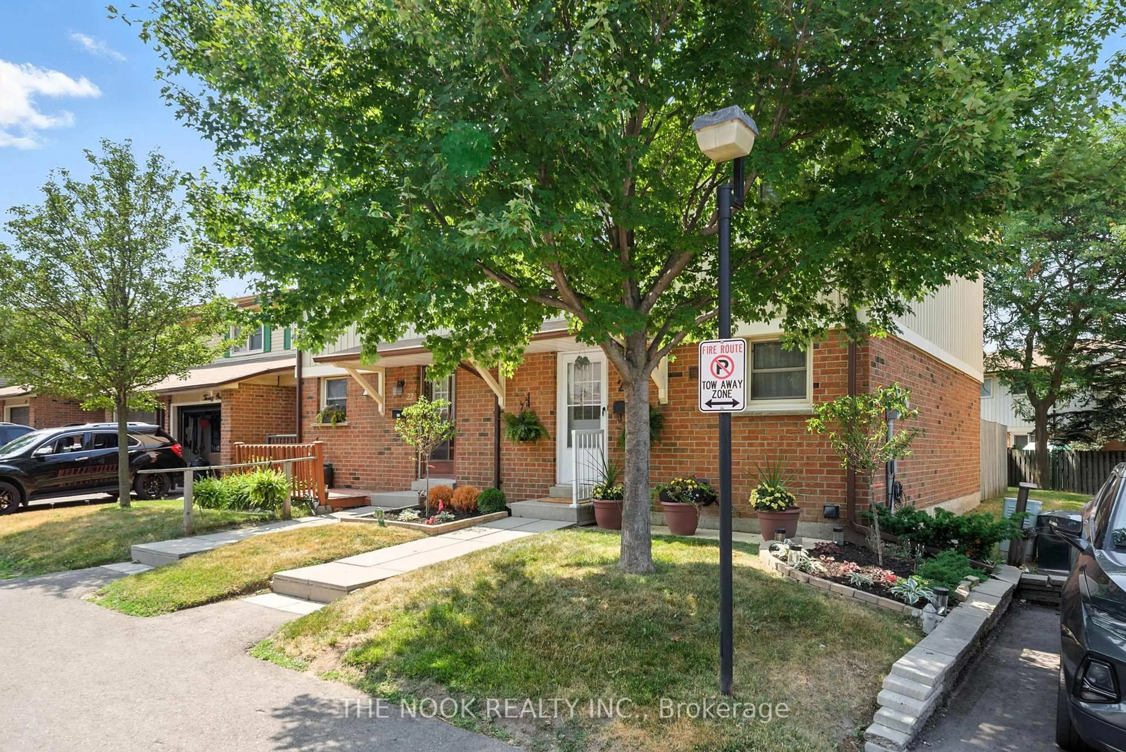 Home with brick exterior material, street for 450 Bristol Cres #23, Oshawa Ontario L1J 6M3