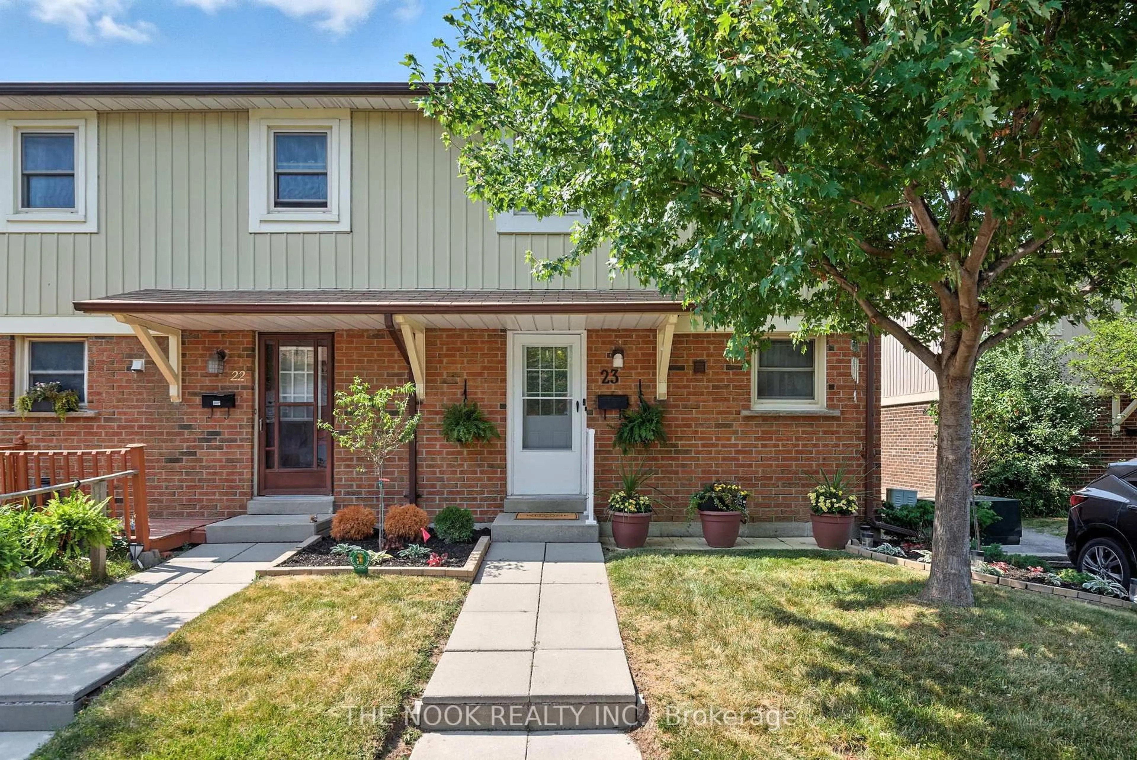 Home with brick exterior material, street for 450 Bristol Cres #23, Oshawa Ontario L1J 6M3