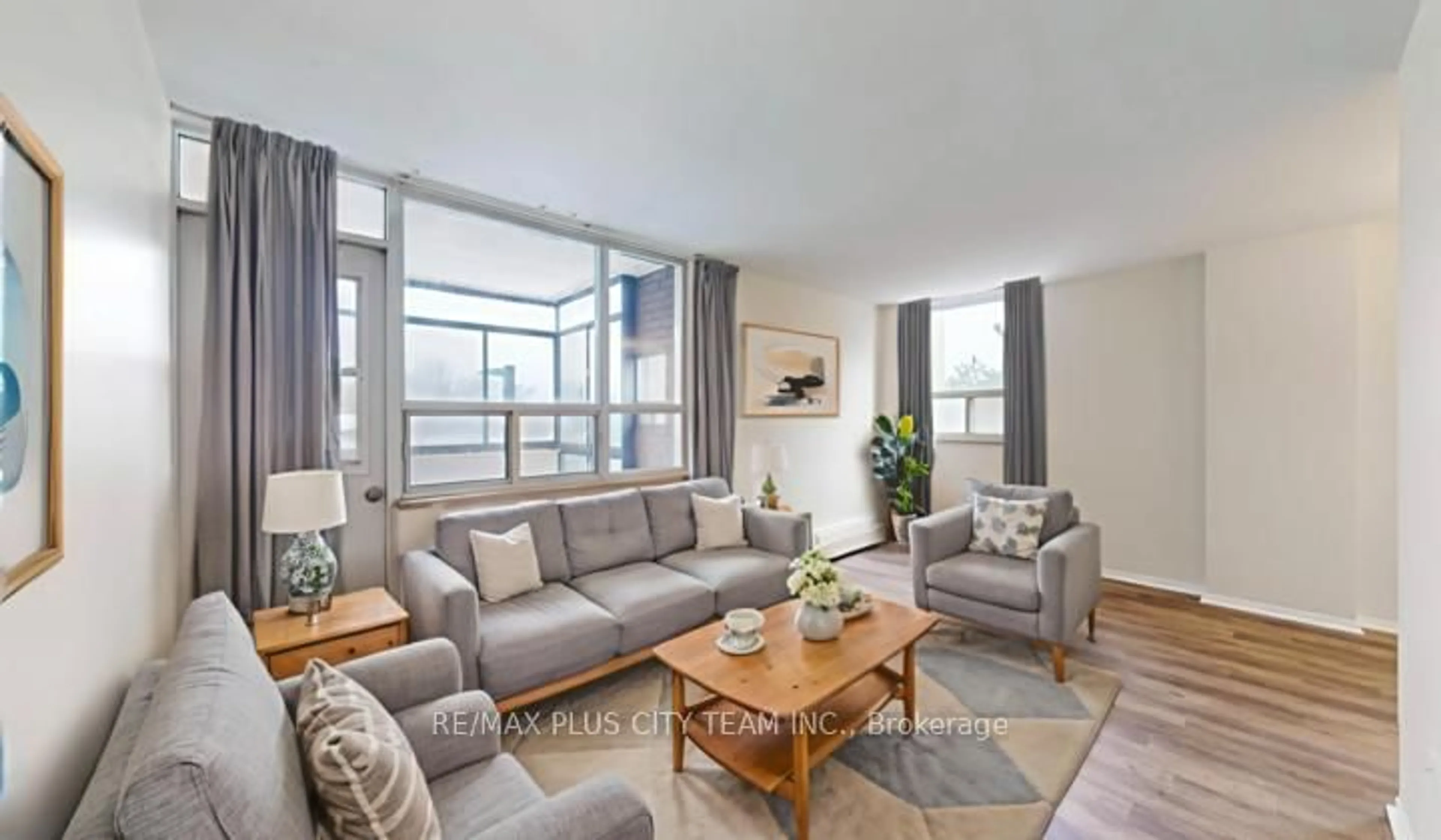 Living room with furniture, unknown for 3311 Kingston Rd #311, Toronto Ontario M1M 1R1