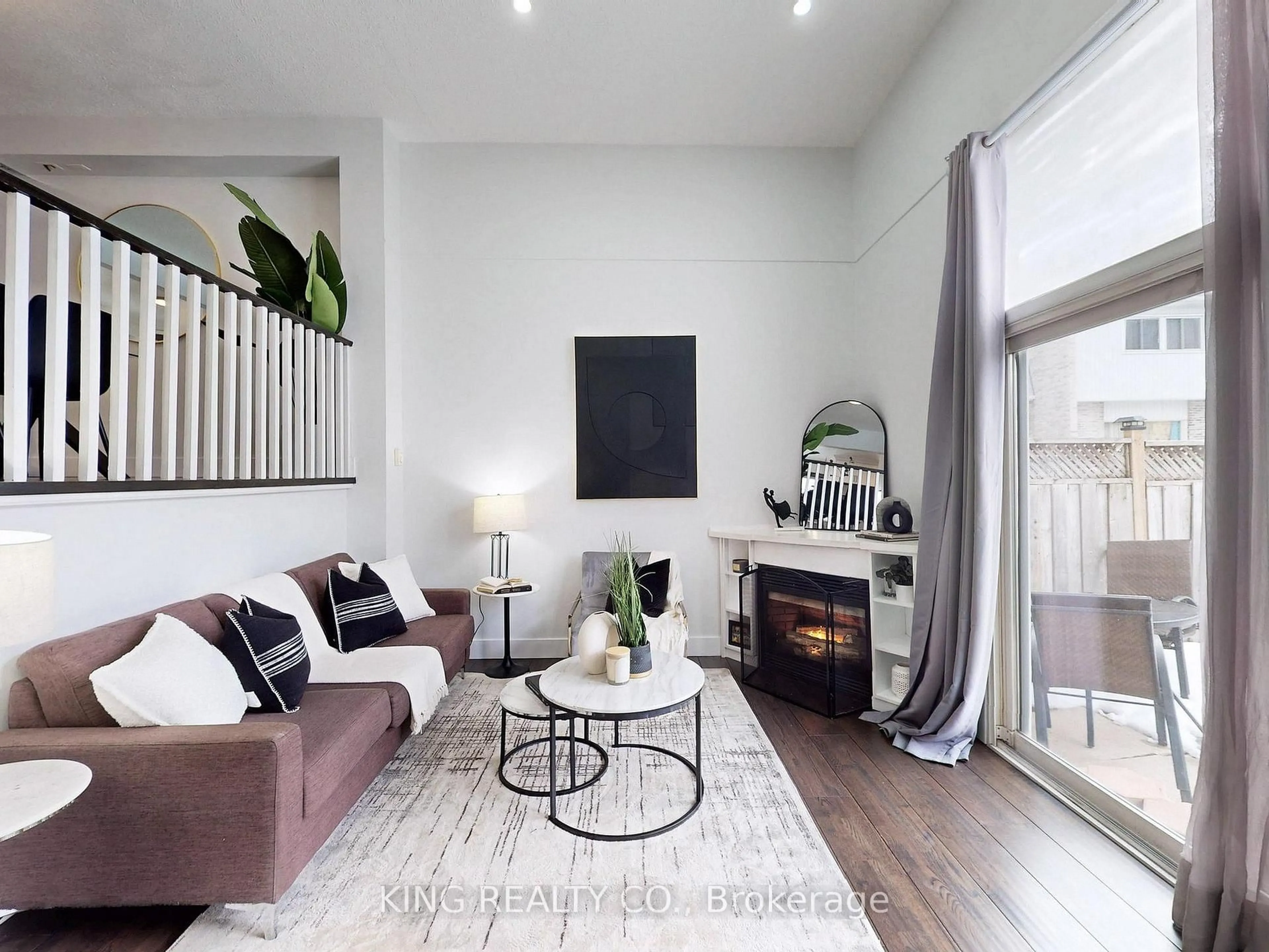 Living room with furniture, wood/laminate floor for 1975 Rosefield Rd #83, Pickering Ontario L1V 3E3