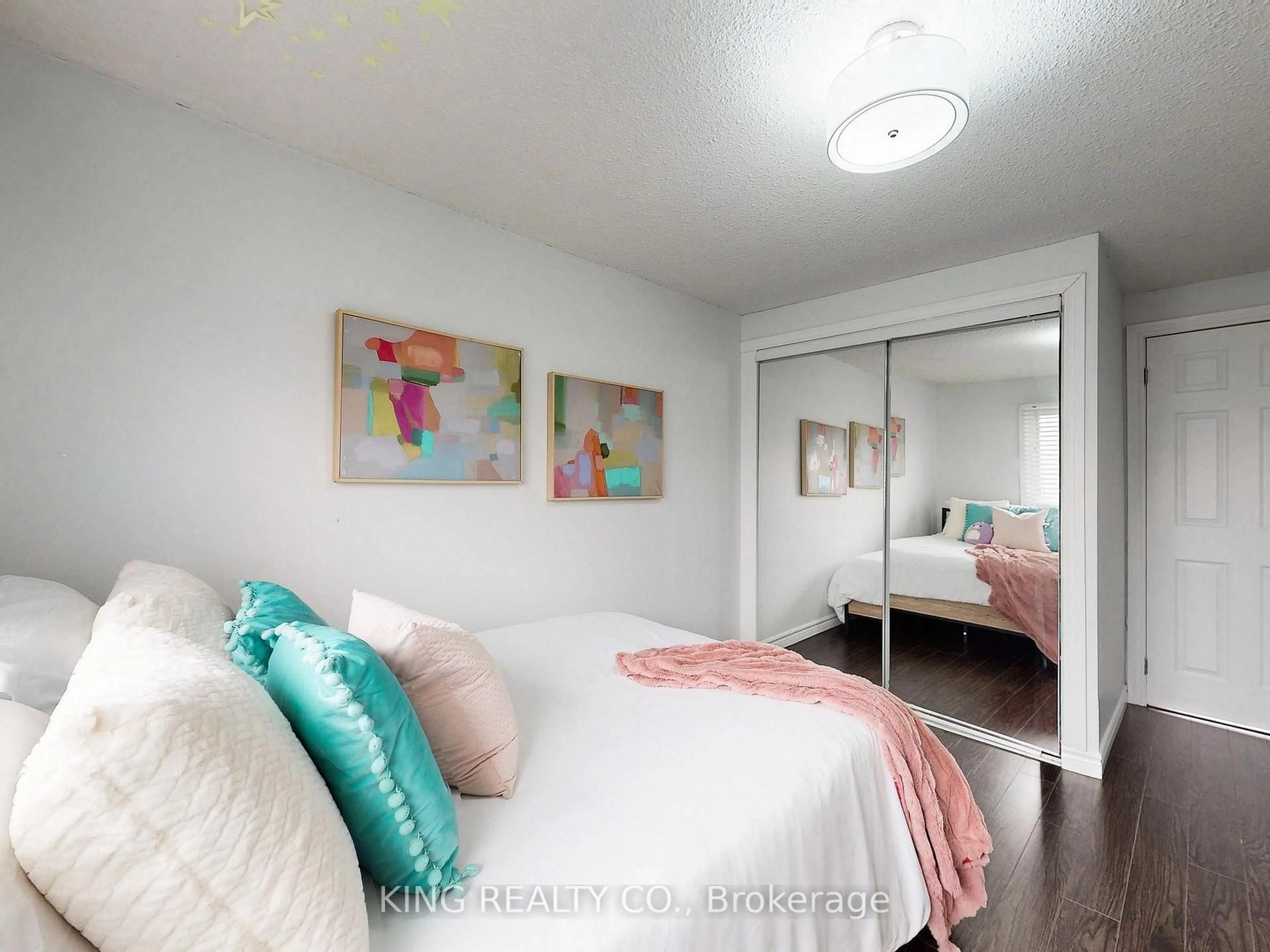 Bedroom with bed, wood/laminate floor for 1975 Rosefield Rd #83, Pickering Ontario L1V 3E3