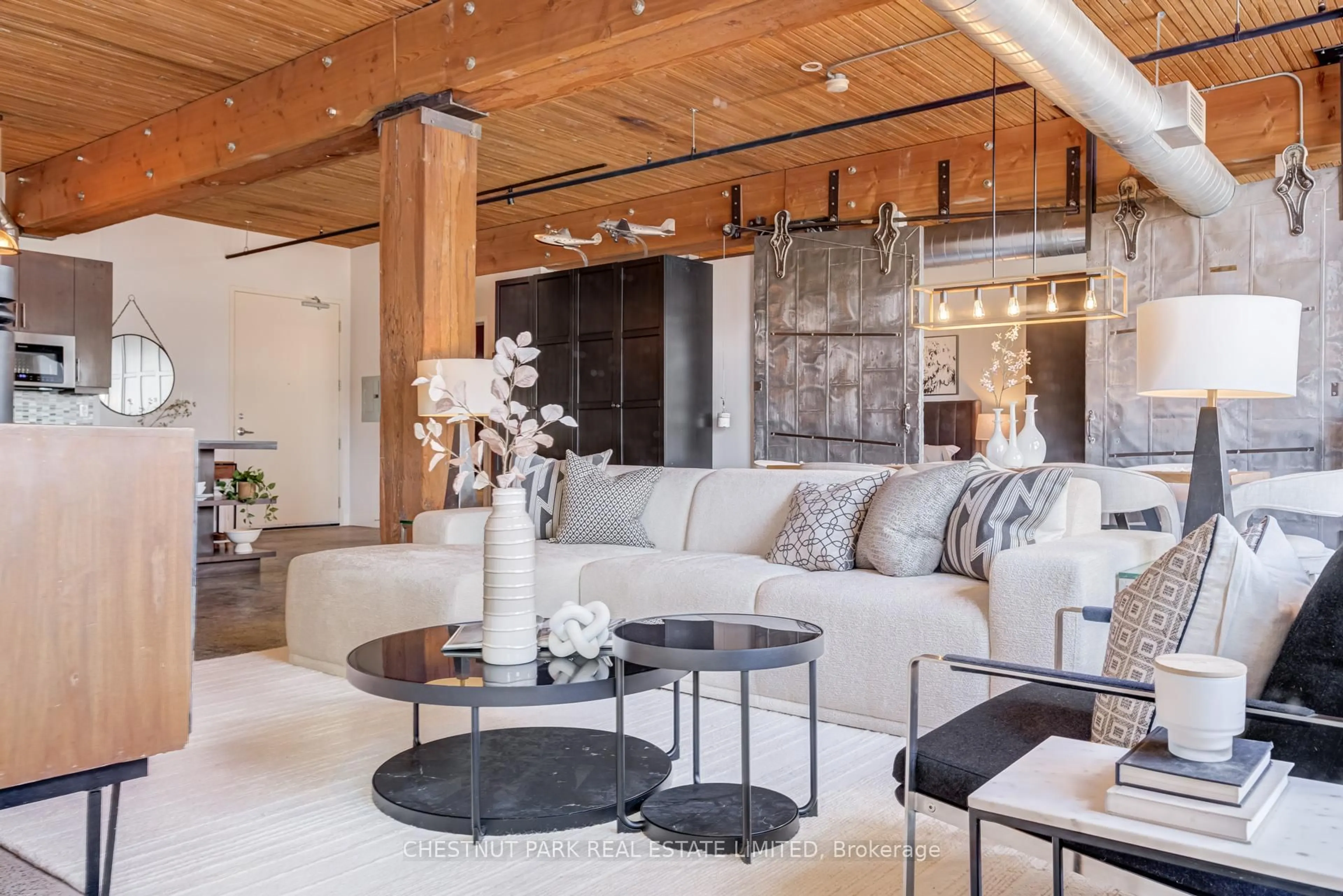 Living room with furniture, unknown for 68 Broadview Ave #105, Toronto Ontario M4M 2E6