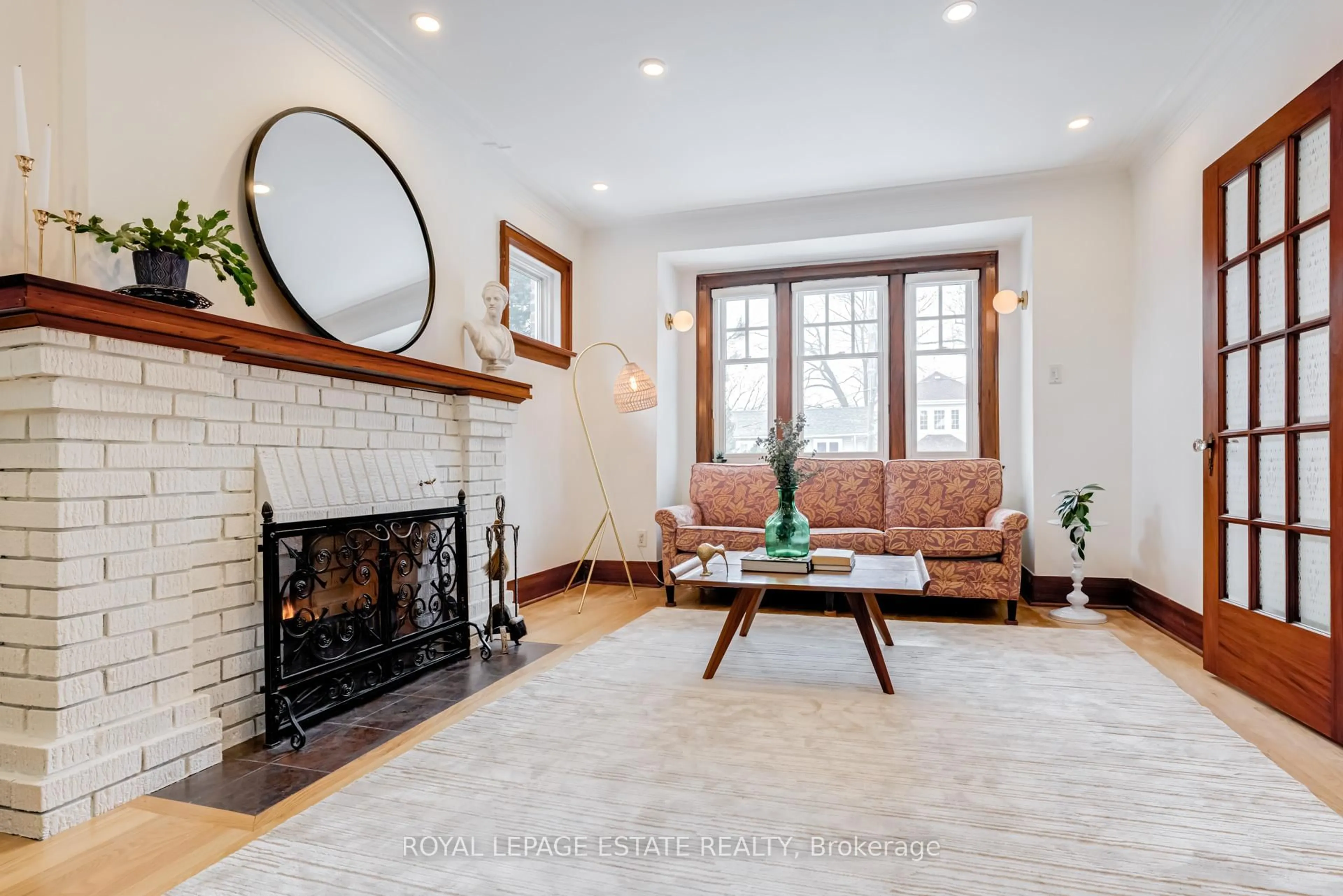 Living room with furniture, ceramic/tile floor for 71 Scarborough Rd, Toronto Ontario M4E 3M4
