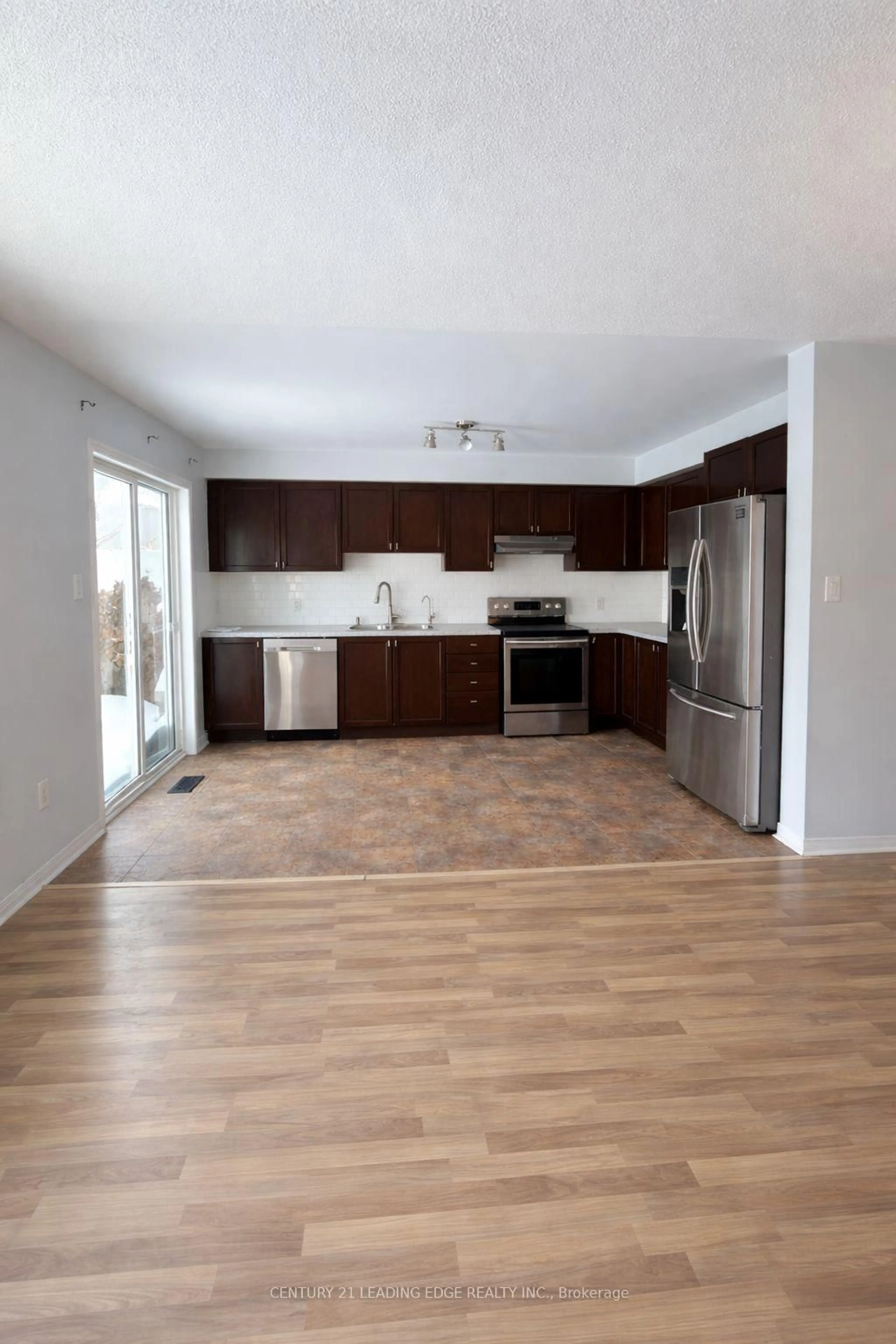 Open concept kitchen, wood/laminate floor for 1523 Glenbourne Dr, Oshawa Ontario L1K 0M5