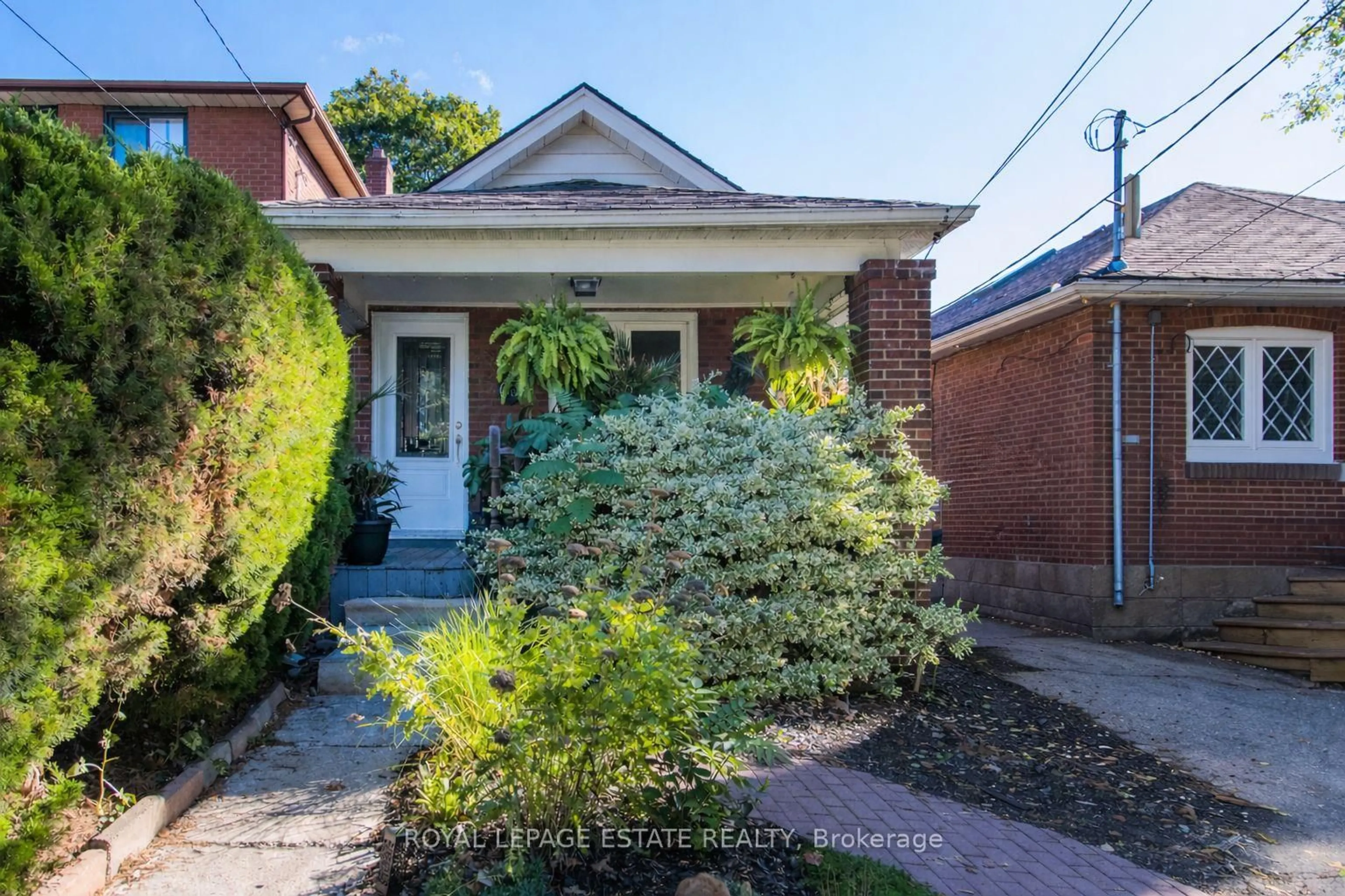 Home with brick exterior material, street for 65 Queensbury Ave, Toronto Ontario M1N 2X8