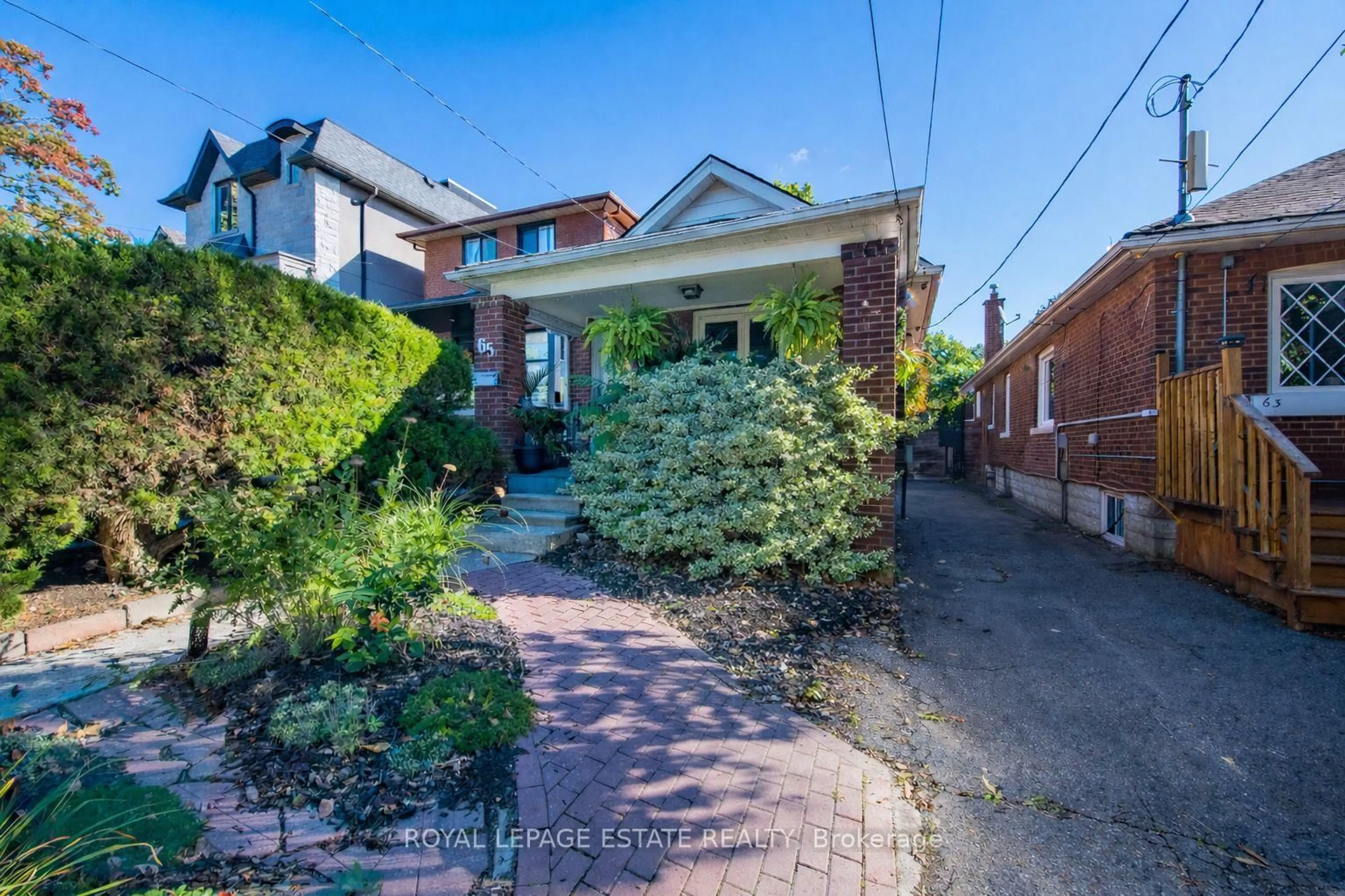 Home with brick exterior material, street for 65 Queensbury Ave, Toronto Ontario M1N 2X8