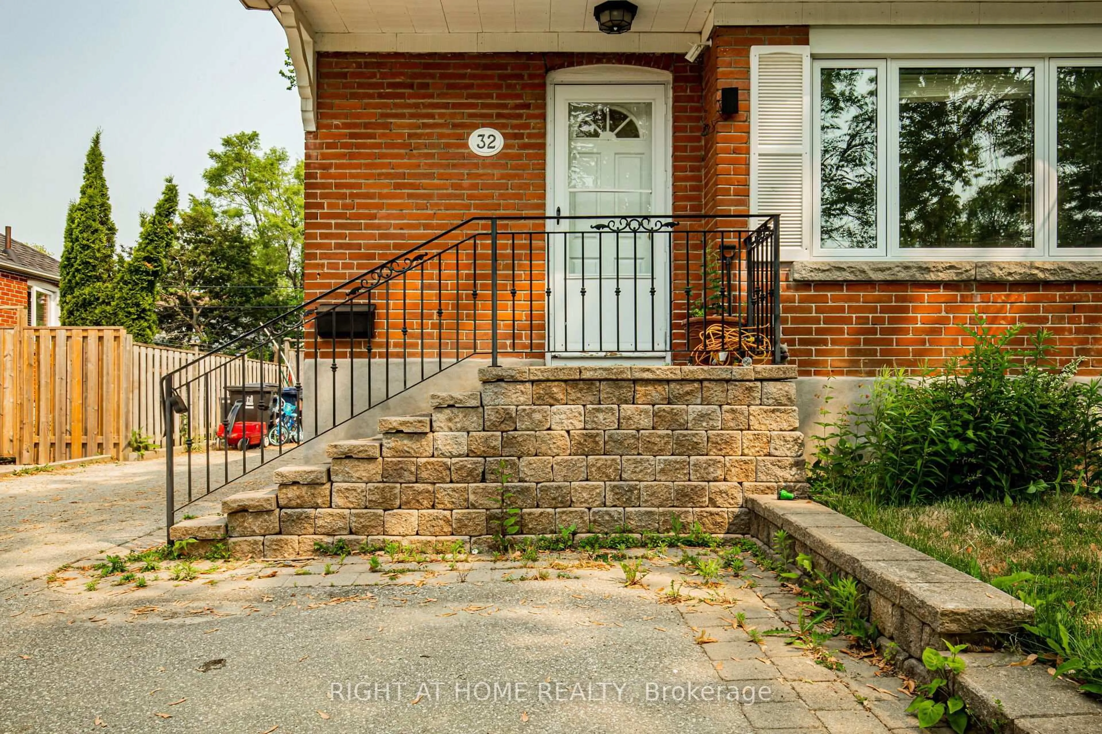 Home with brick exterior material, street for 32 Florens Ave, Toronto Ontario M1L 1R6