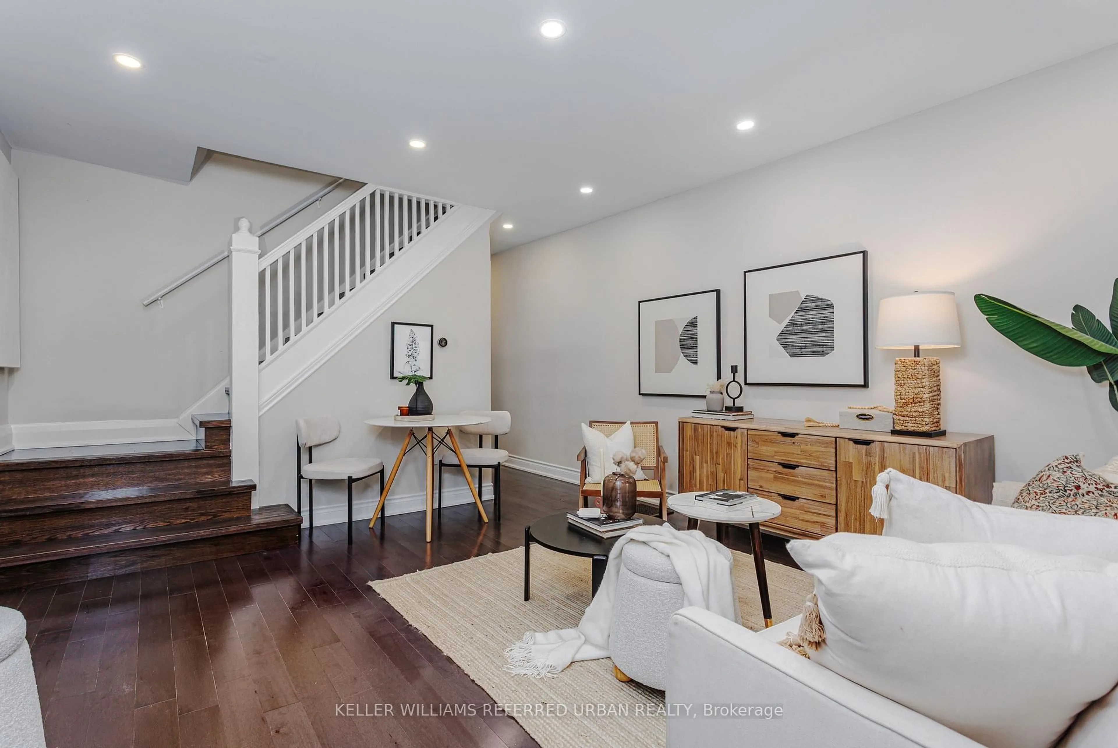 Living room with furniture, unknown for 647 Rhodes Ave, Toronto Ontario M4J 4X5