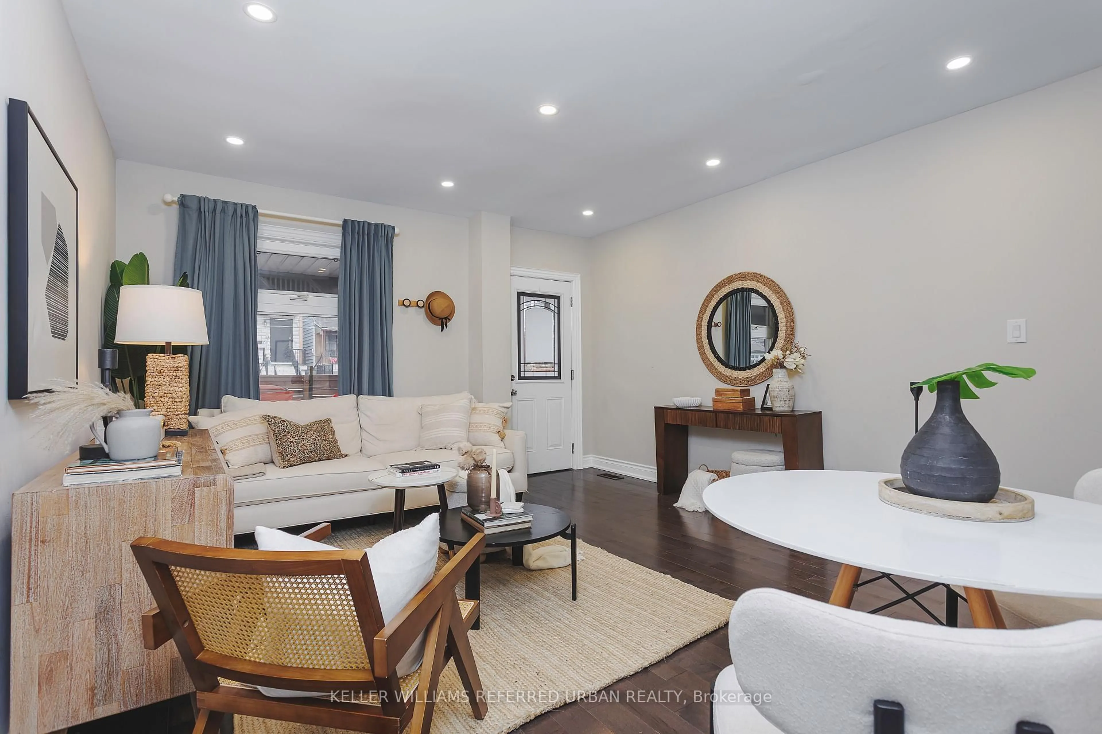 Living room with furniture, unknown for 647 Rhodes Ave, Toronto Ontario M4J 4X5