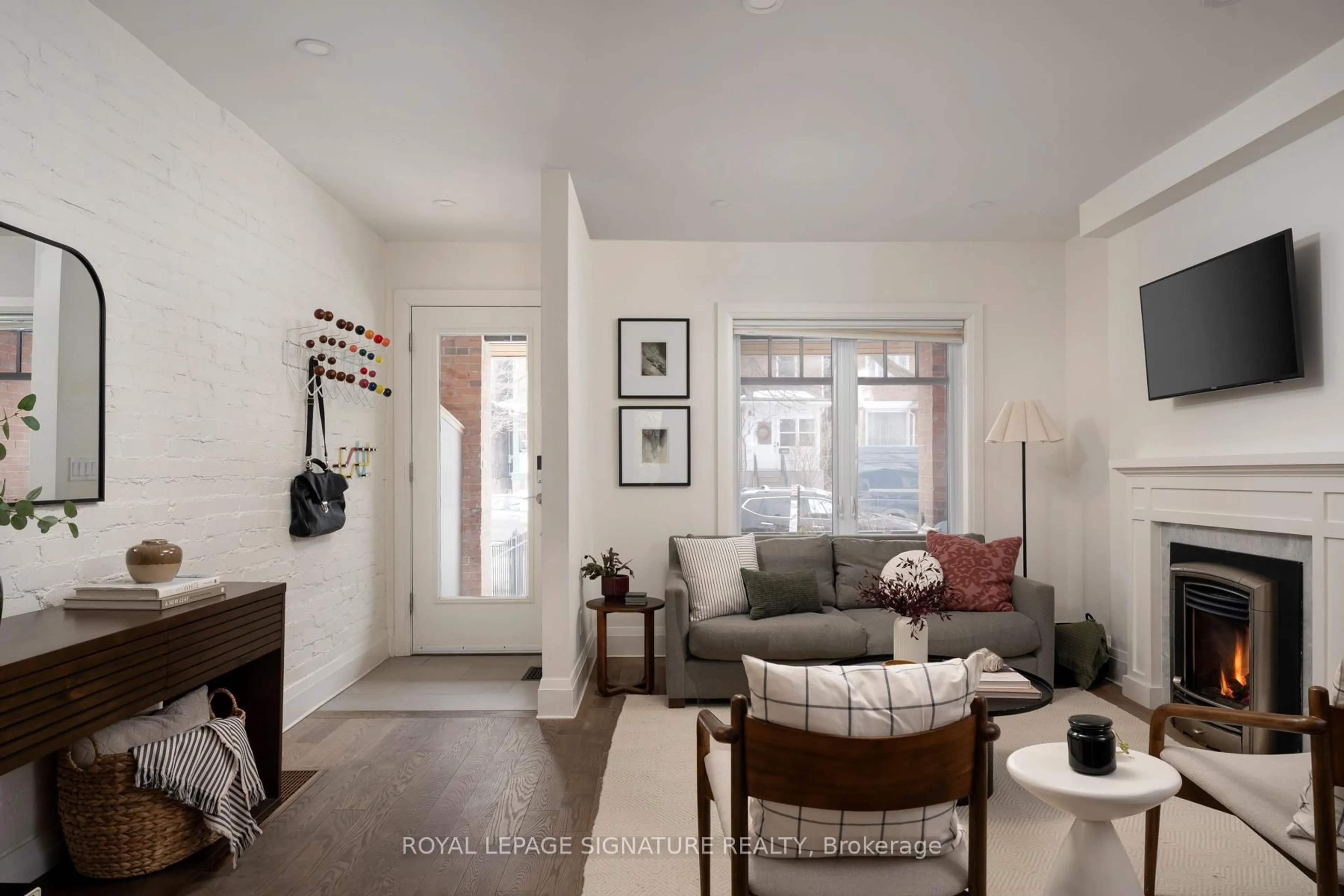 Living room with furniture, unknown for 119 Alton Ave, Toronto Ontario M4L 2M3