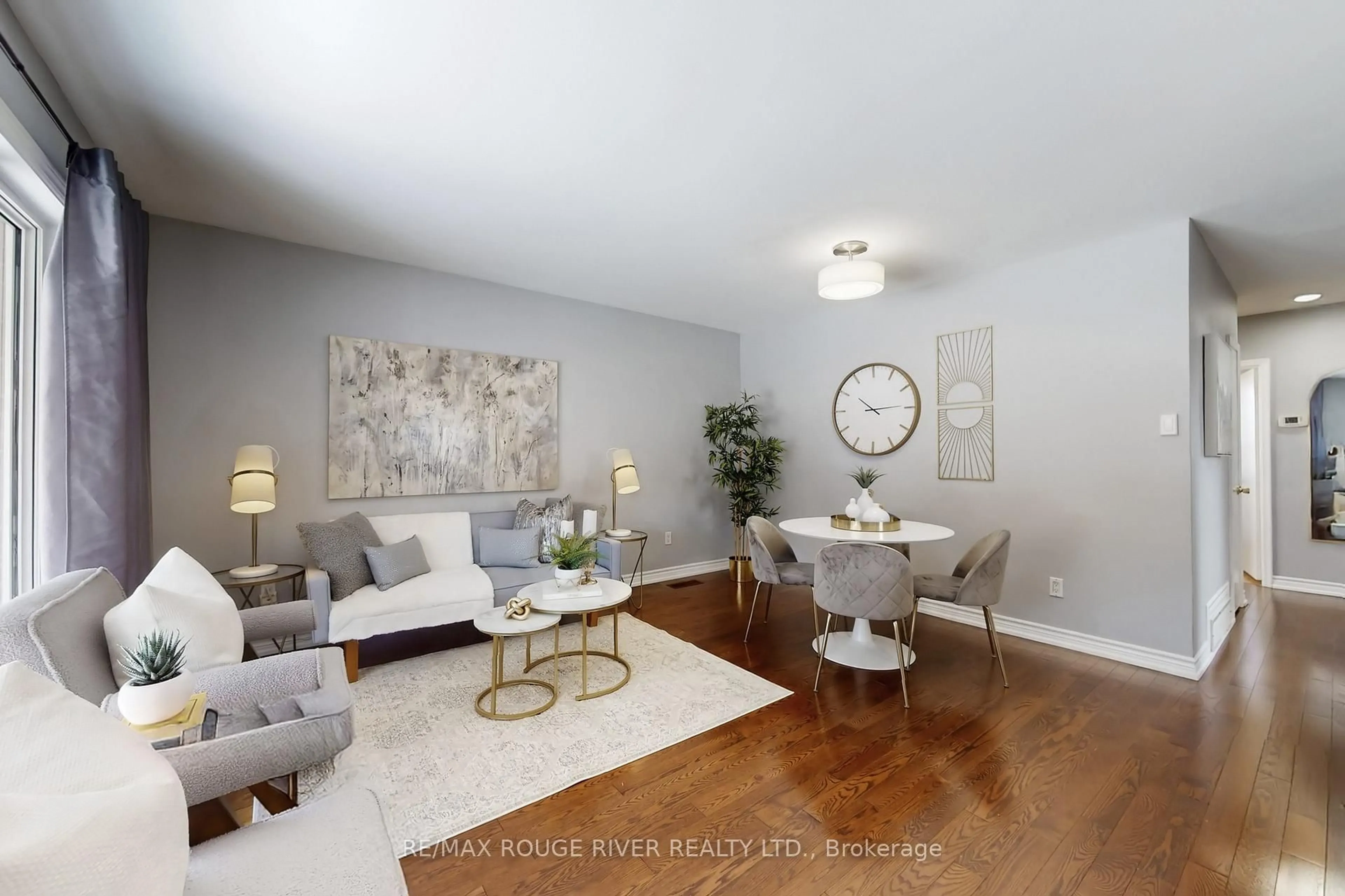 Living room with furniture, wood/laminate floor for 116 Lord Roberts Dr, Toronto Ontario M1K 3W8