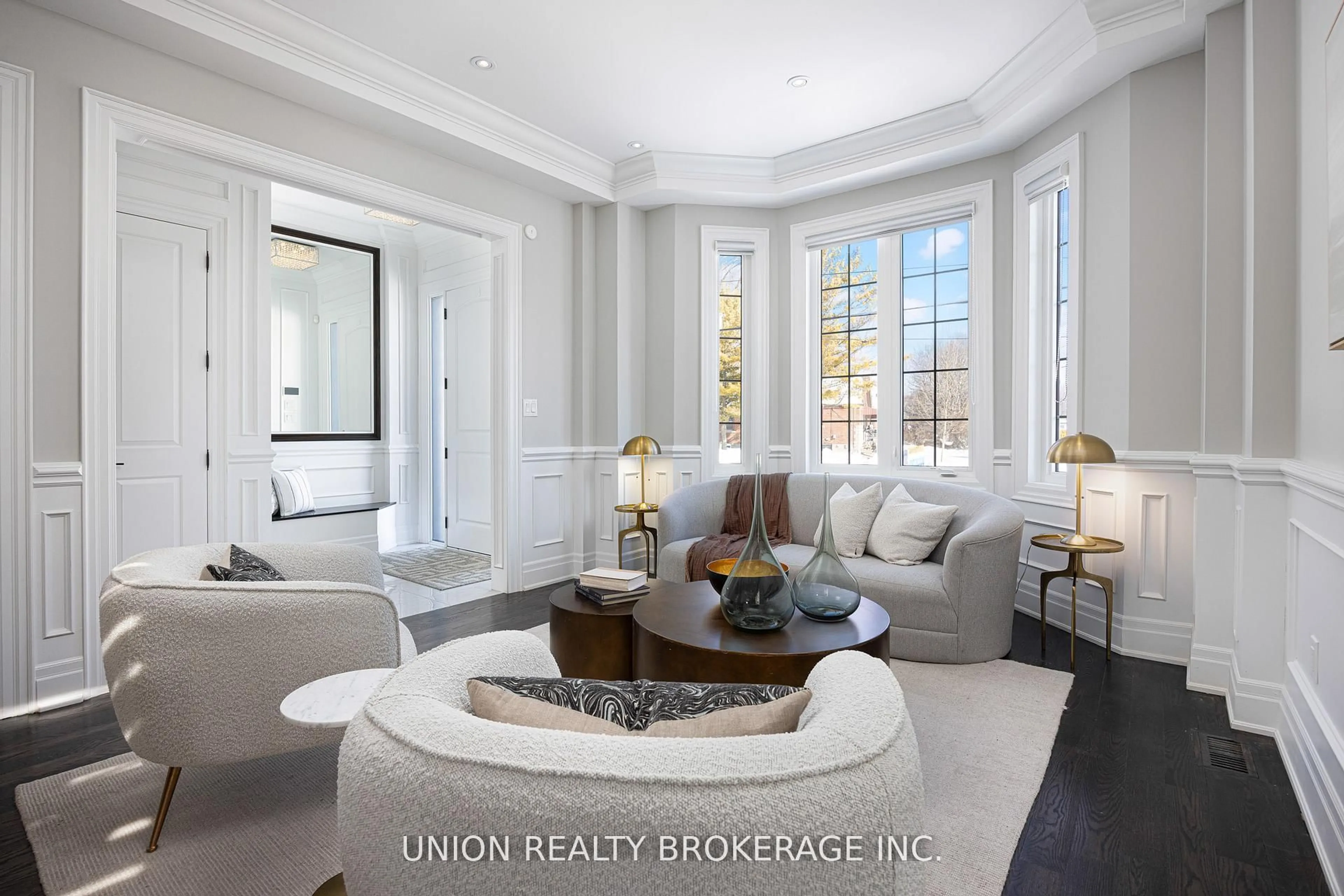 Living room with furniture, wood/laminate floor for 44 Scarboro Cres, Toronto Ontario M1M 2J4