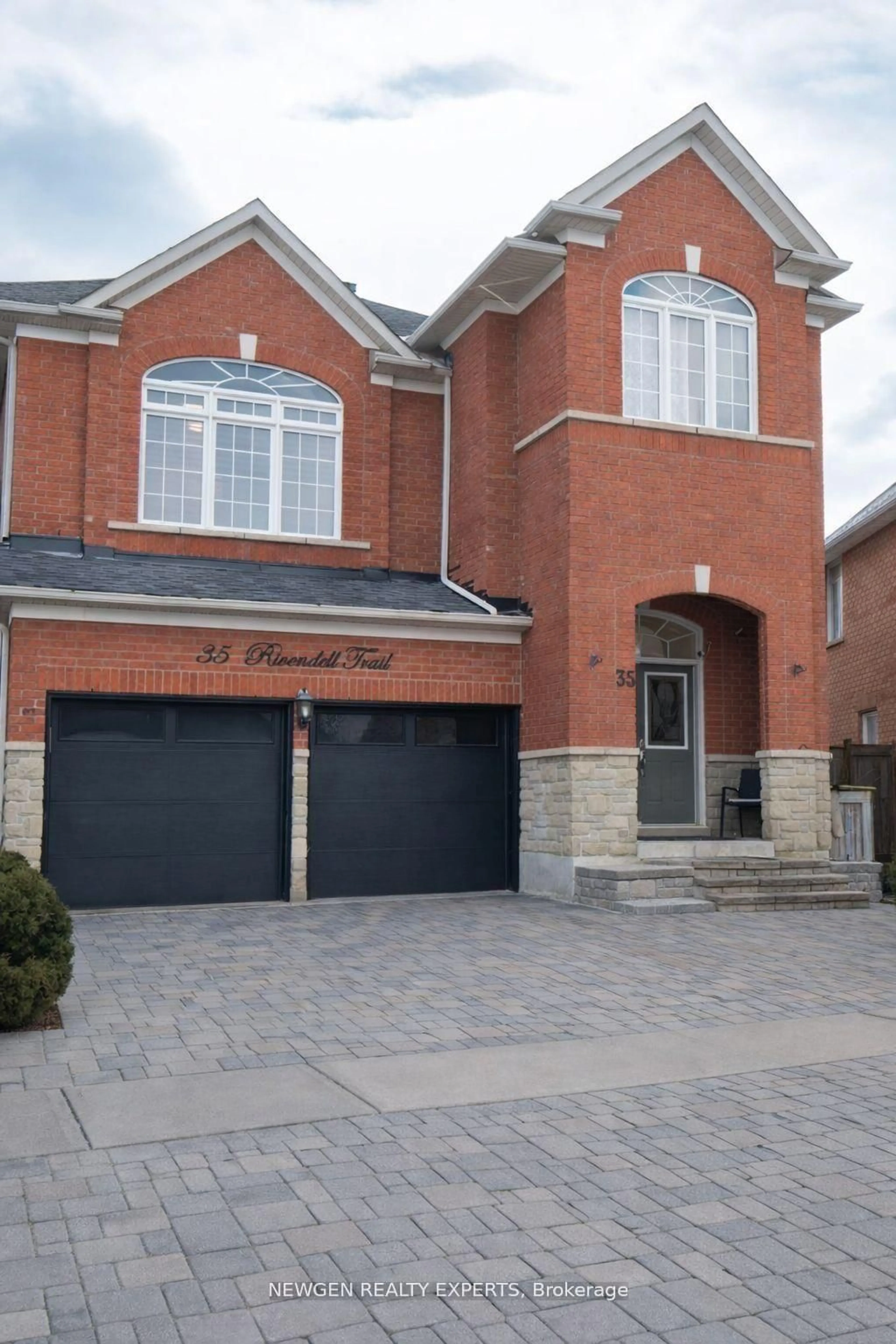 Home with brick exterior material, street for 35 Rivendell Tr, Toronto Ontario M1X 2C2