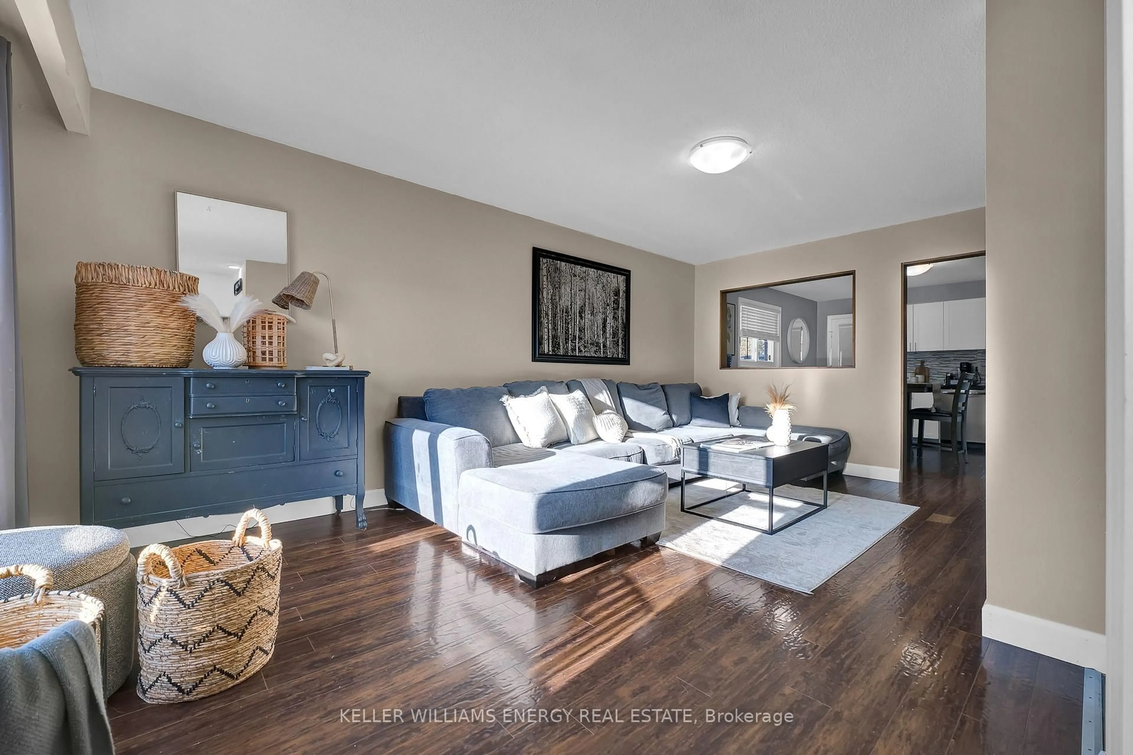 Living room with furniture, wood/laminate floor for 199 Barkley Cres, Oshawa Ontario L1J 2E5