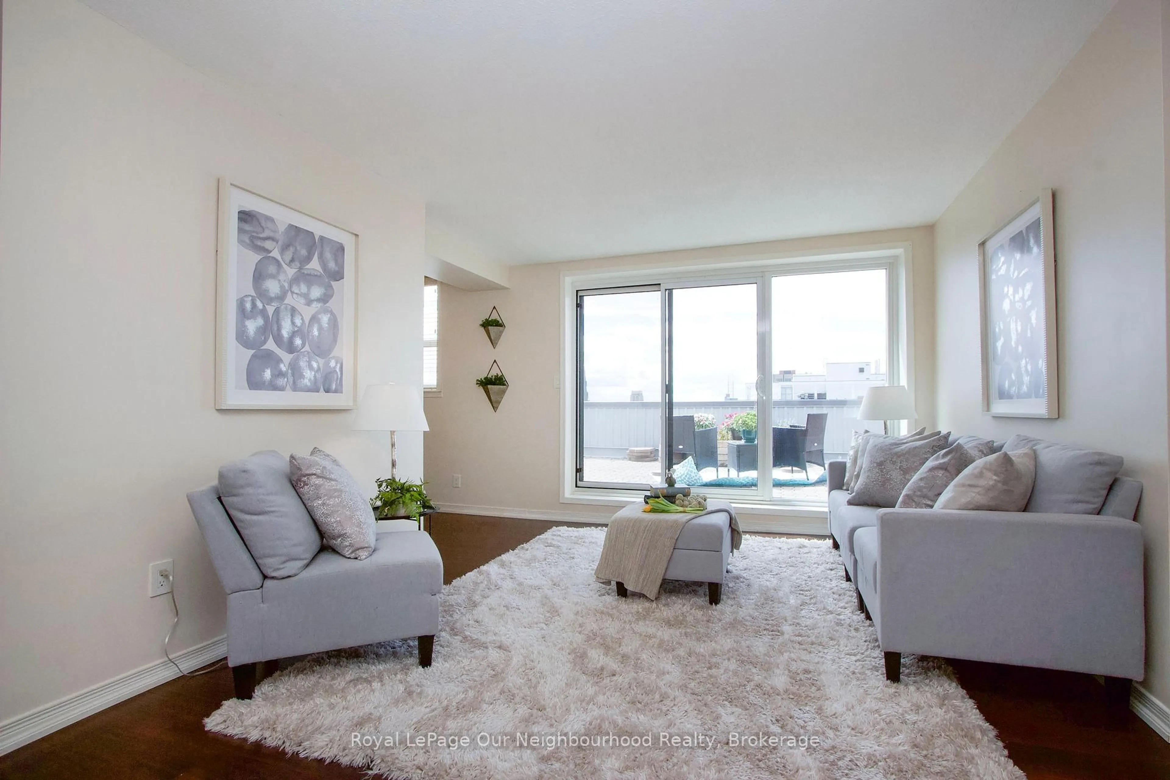 Living room with furniture, unknown for 80 Athol St #702, Oshawa Ontario L1H 8B7