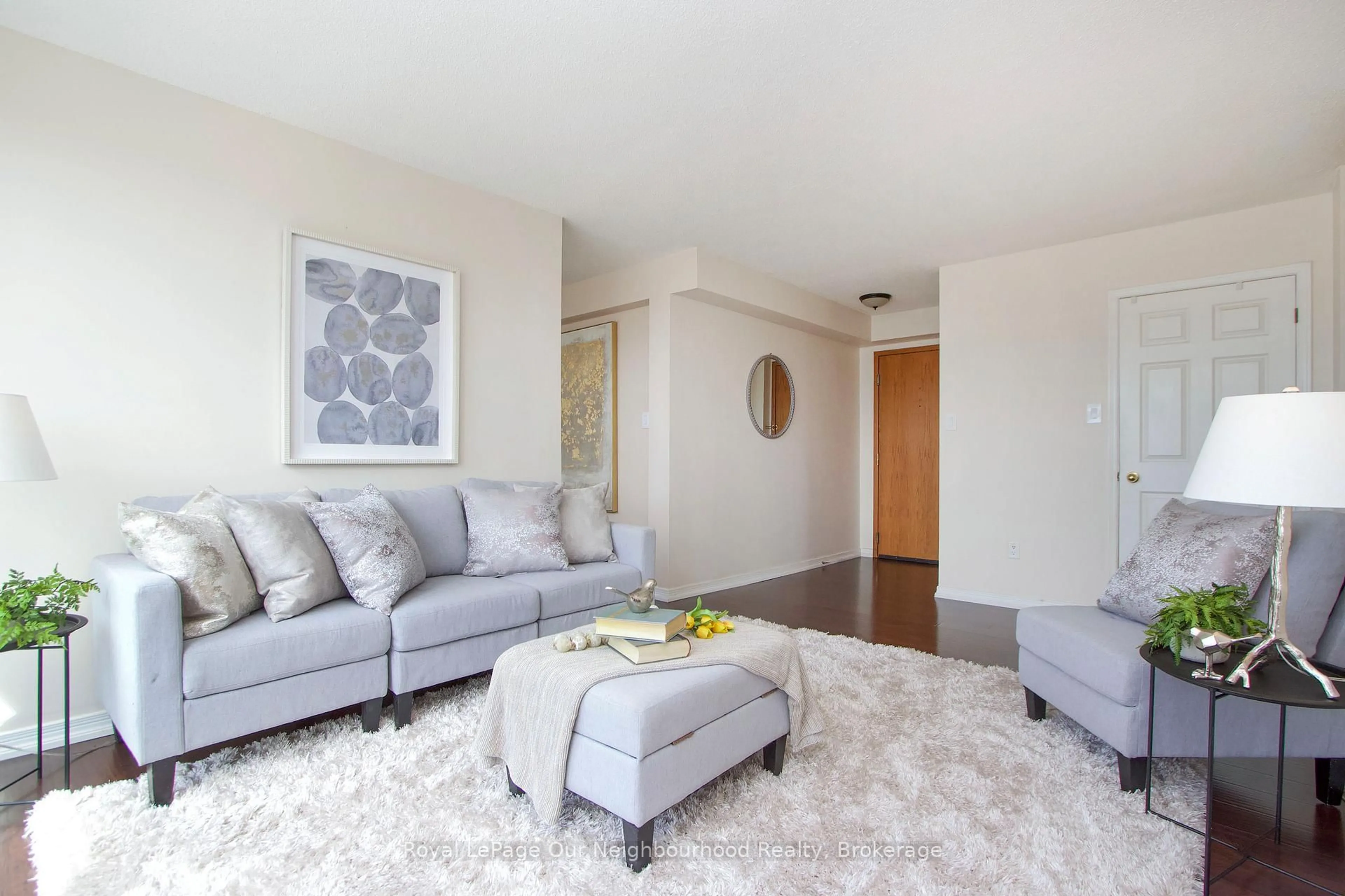 Living room with furniture, unknown for 80 Athol St #702, Oshawa Ontario L1H 8B7