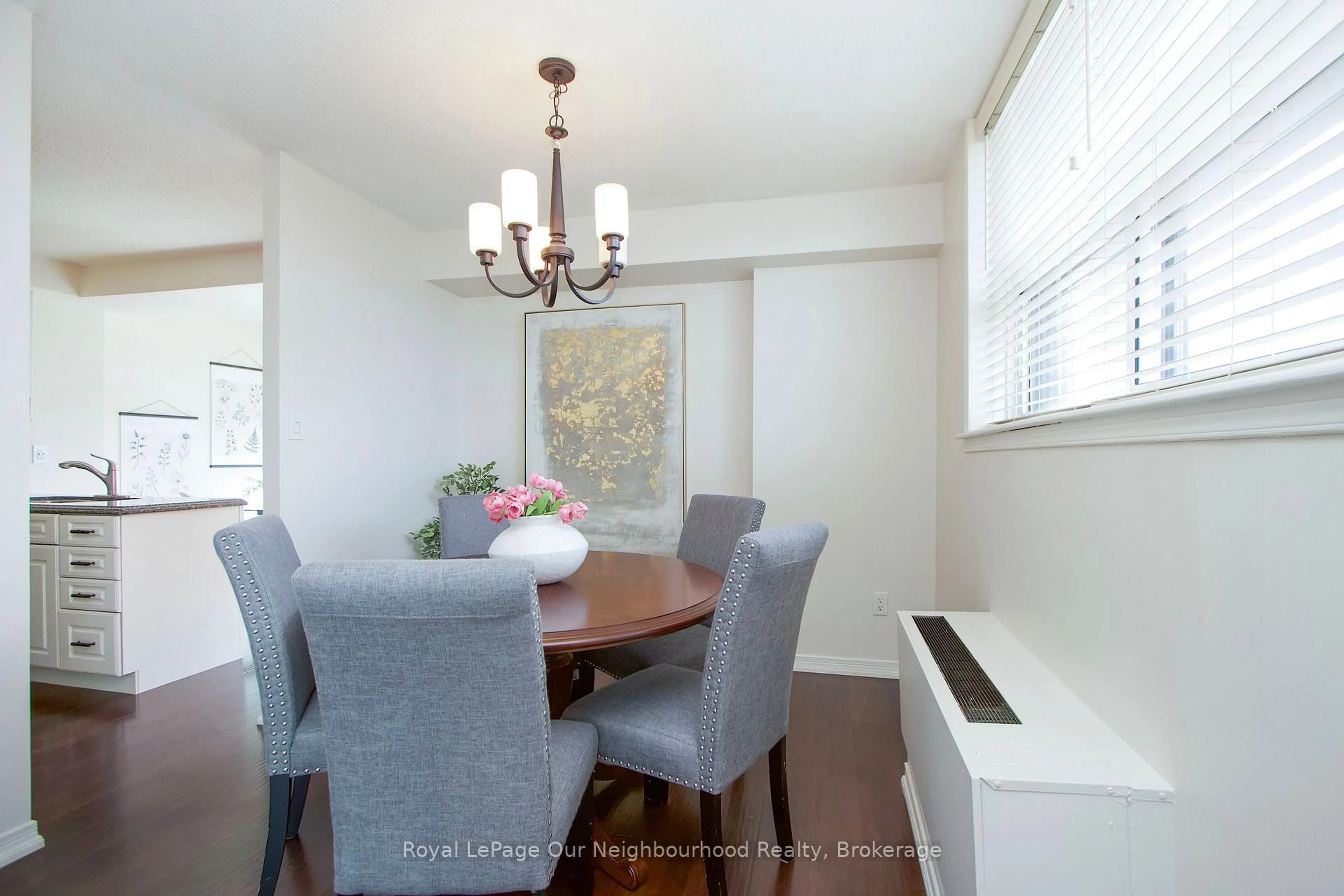 Dining room, wood/laminate floor for 80 Athol St #702, Oshawa Ontario L1H 8B7