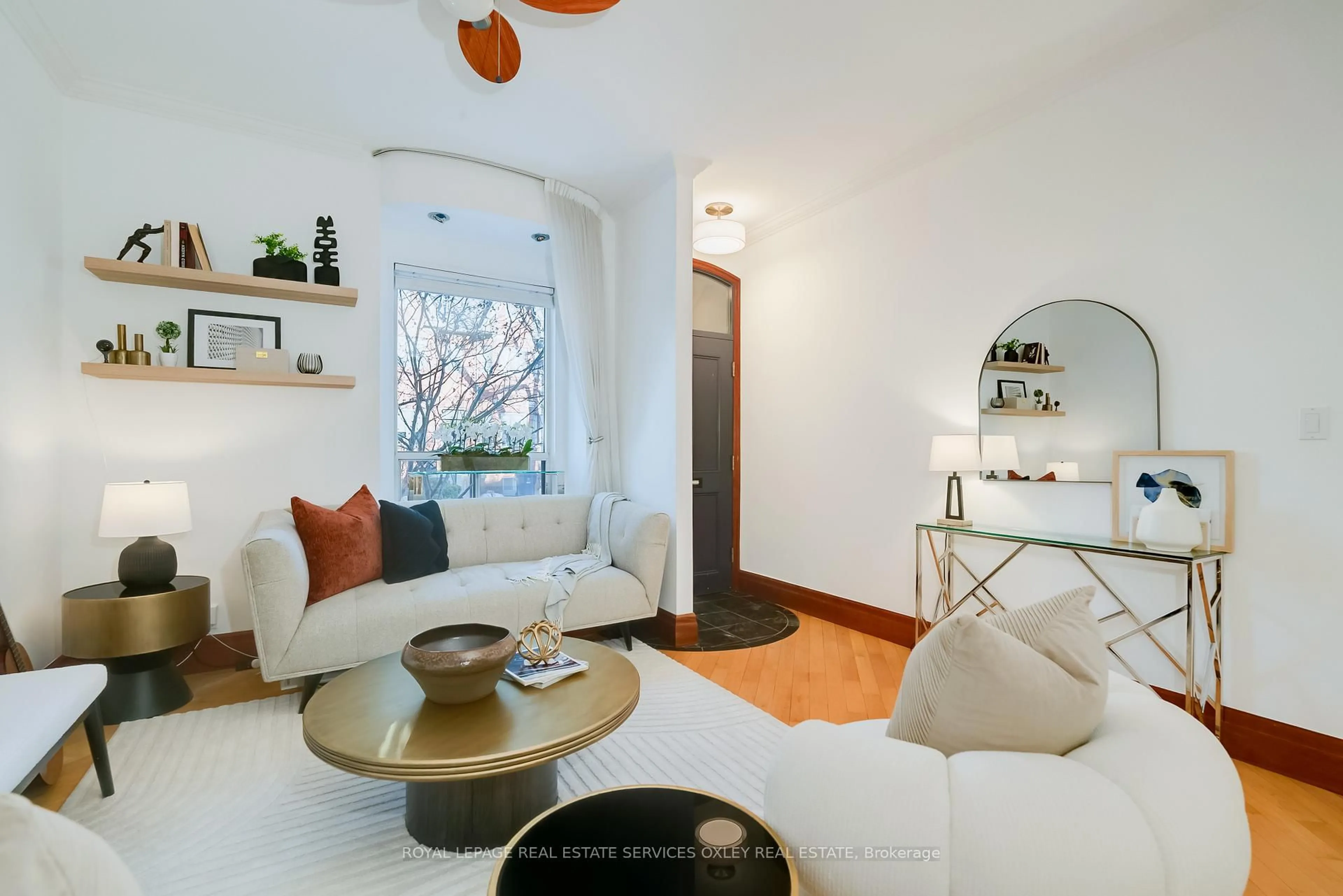 Living room with furniture, ceramic/tile floor for 16 Boulton Ave, Toronto Ontario M4M 2J3