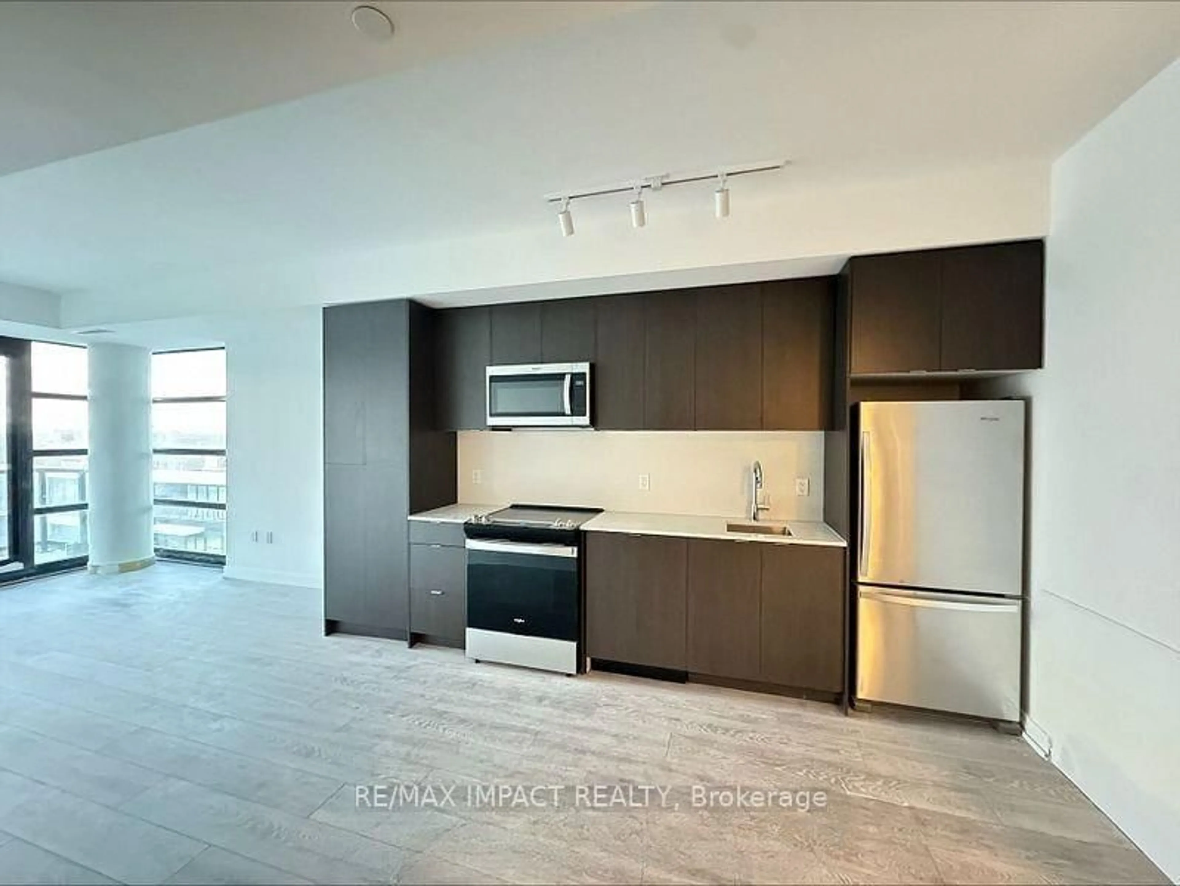 Open concept kitchen, ceramic/tile floor for 1606 Charles St #603, Whitby Ontario L1N 0P1