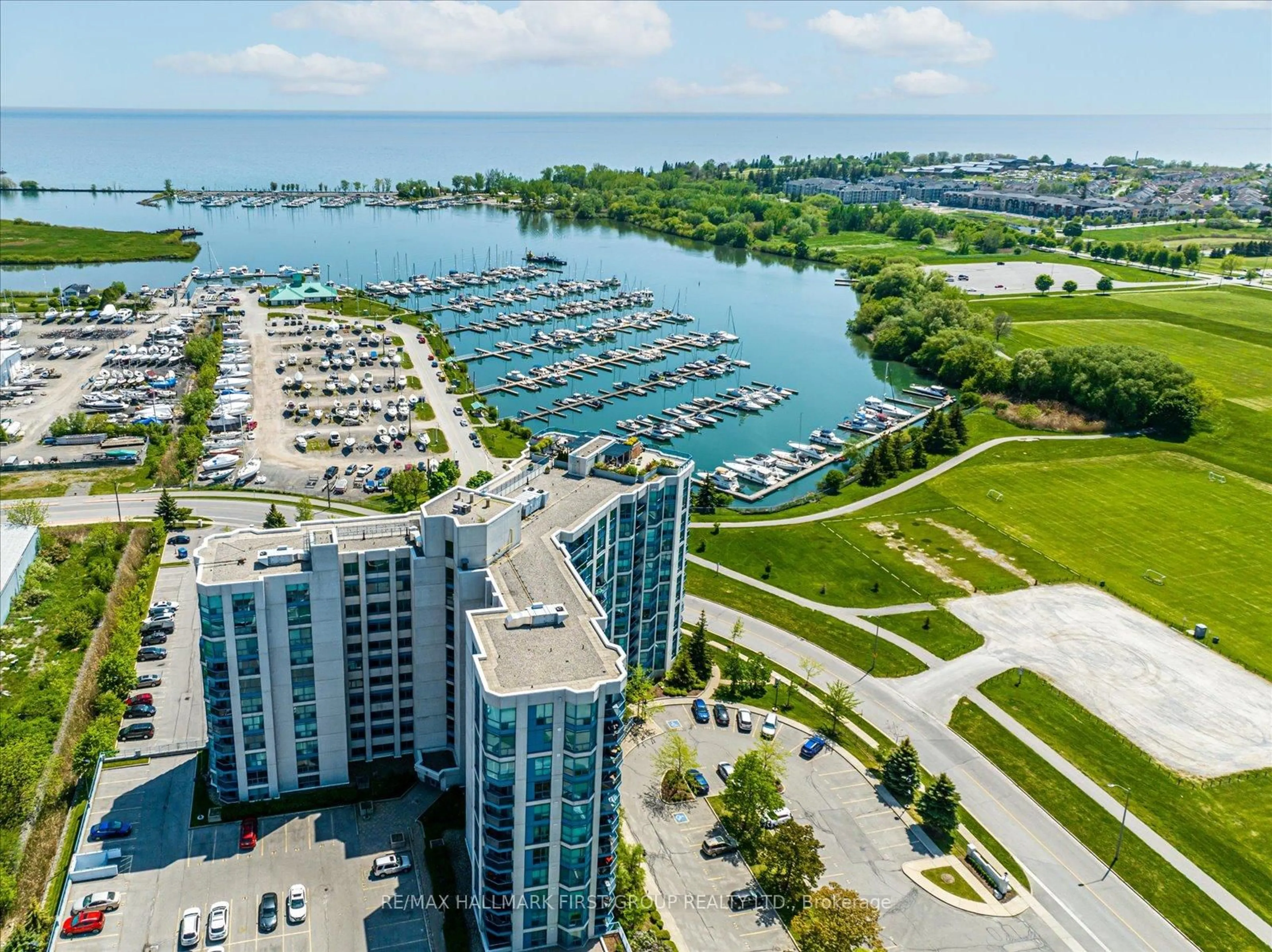 A pic from outside/outdoor area/front of a property/back of a property/a pic from drone, water/lake/river/ocean view for 340 Watson St #218, Whitby Ontario L1N 9G1