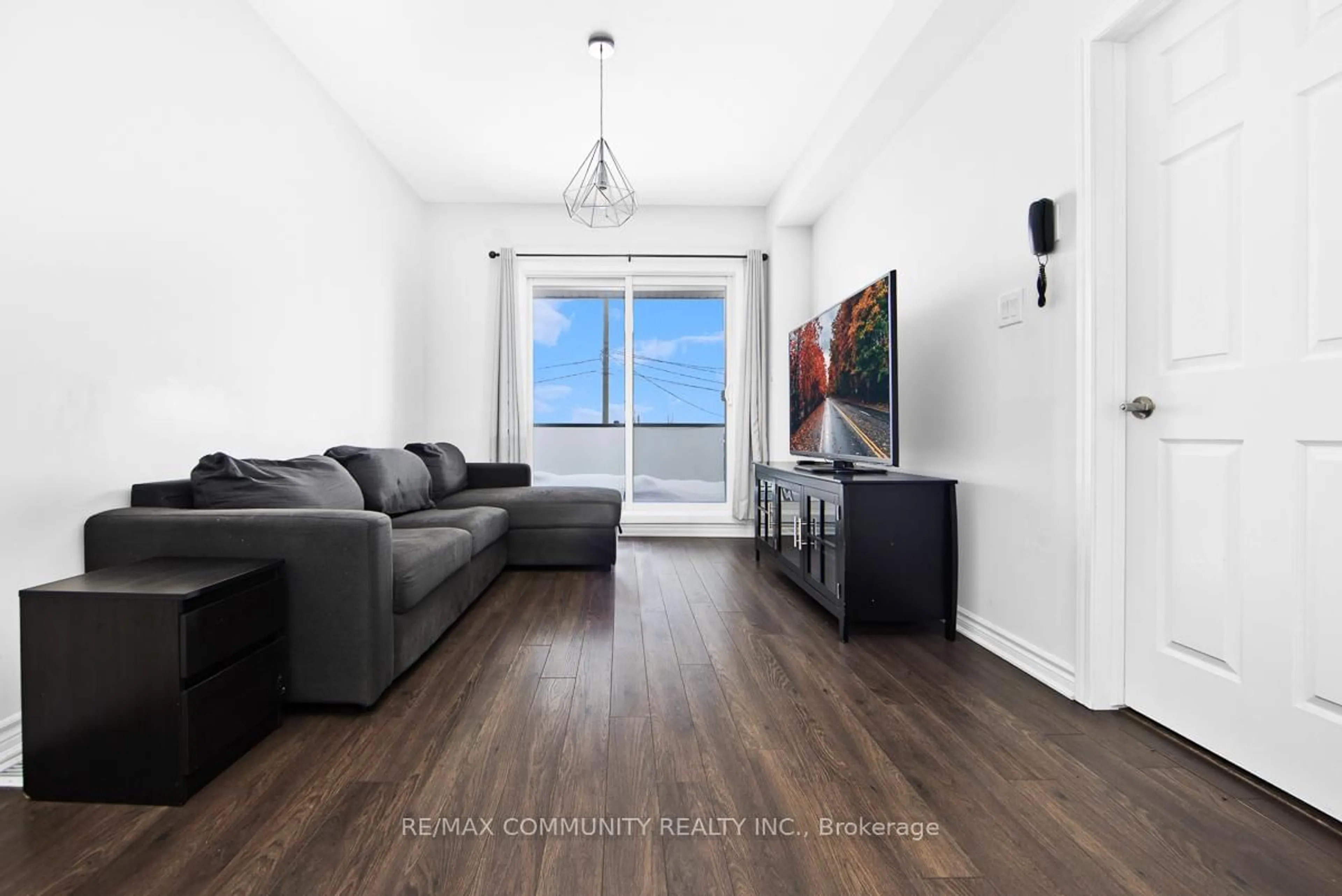 Living room with furniture, wood/laminate floor for 1148 Dragonfly Ave #511, Pickering Ontario L1X 0H5