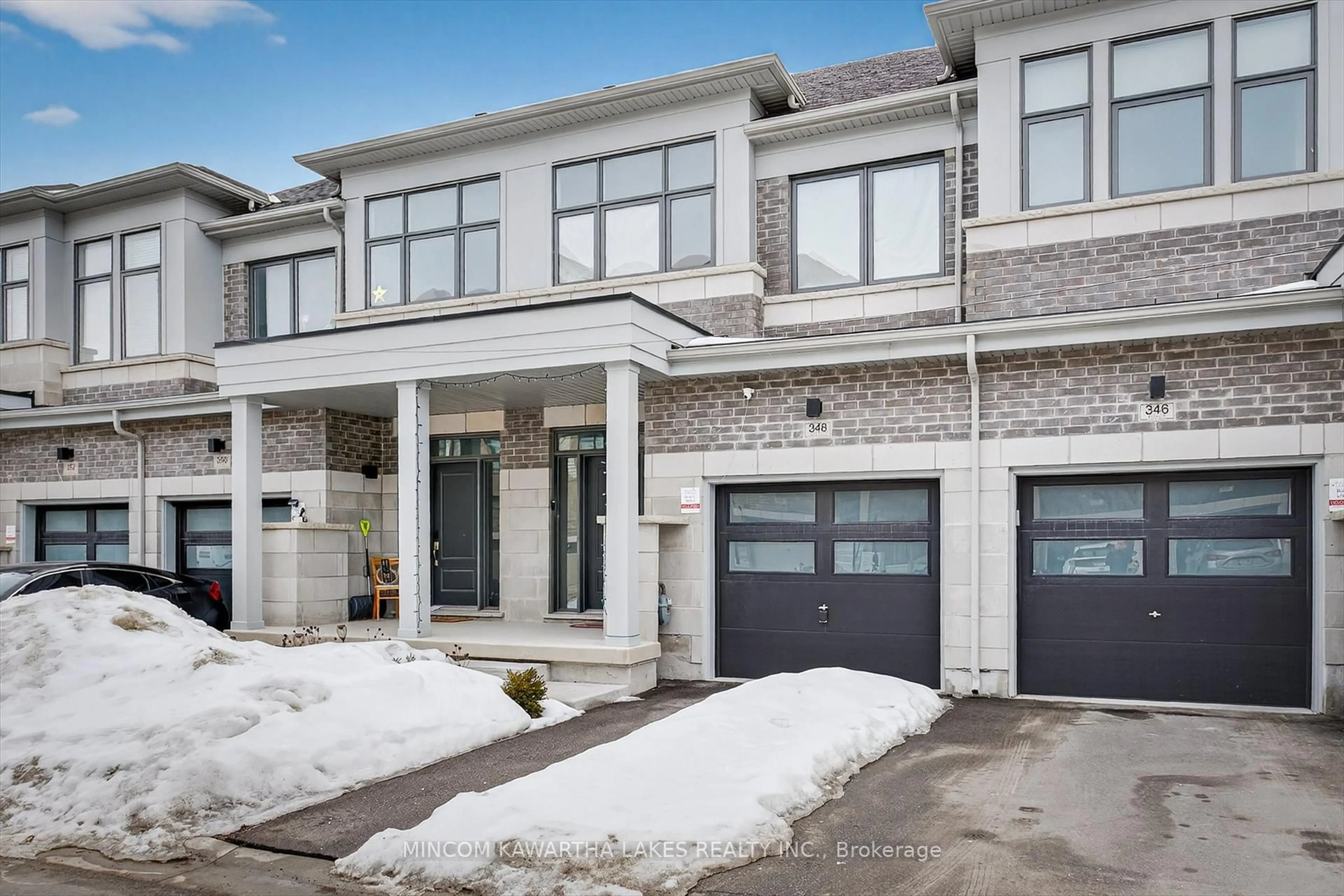 Home with brick exterior material, street for 348 Okanagan Path, Oshawa Ontario L1H 0A7