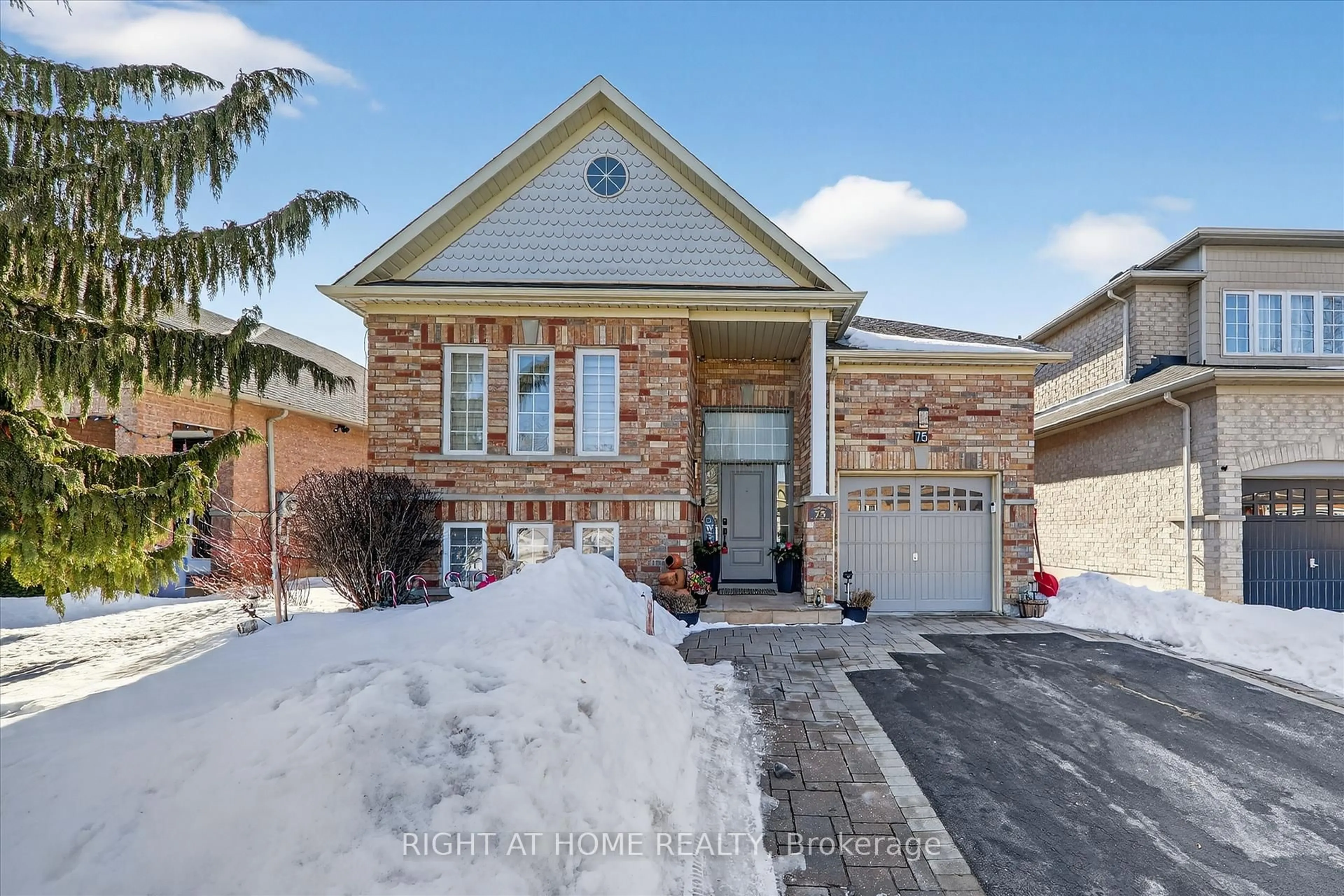 Home with brick exterior material, street for 75 Fencerow Dr, Whitby Ontario L1R 3N2