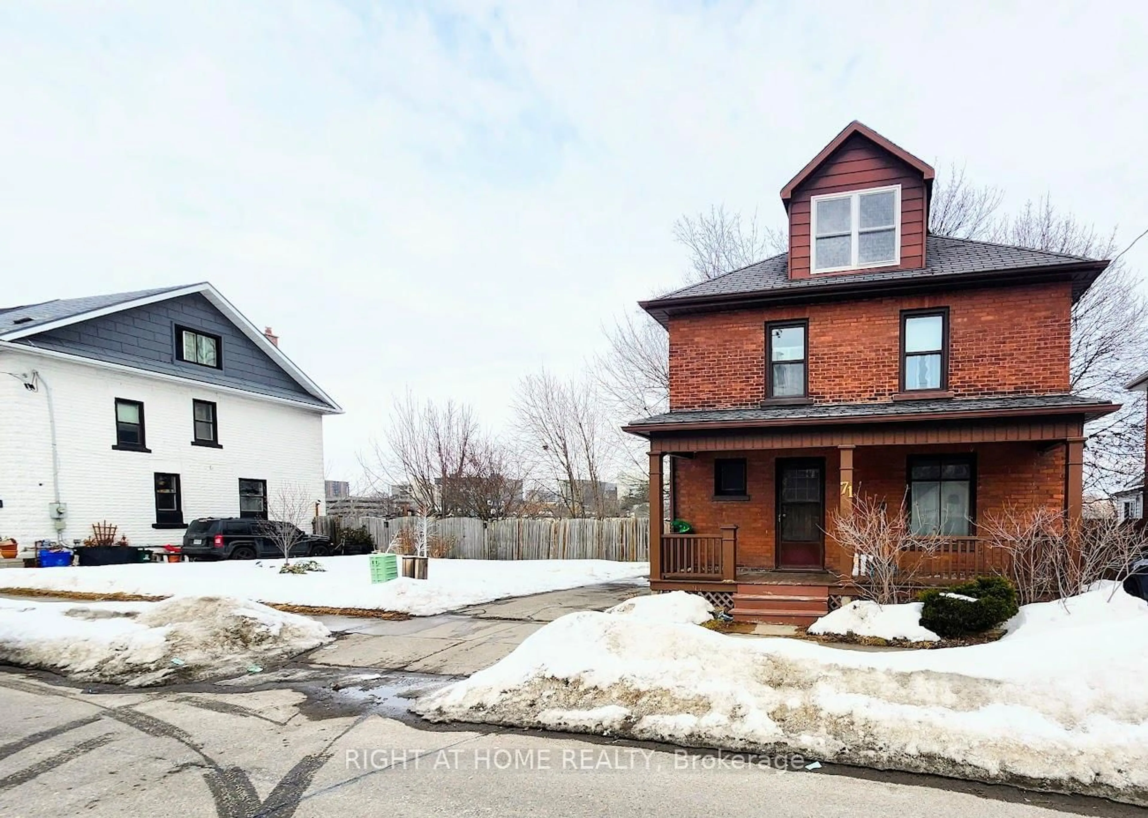 Home with brick exterior material, street for 71 Nassau St, Oshawa Ontario L1J 4A3