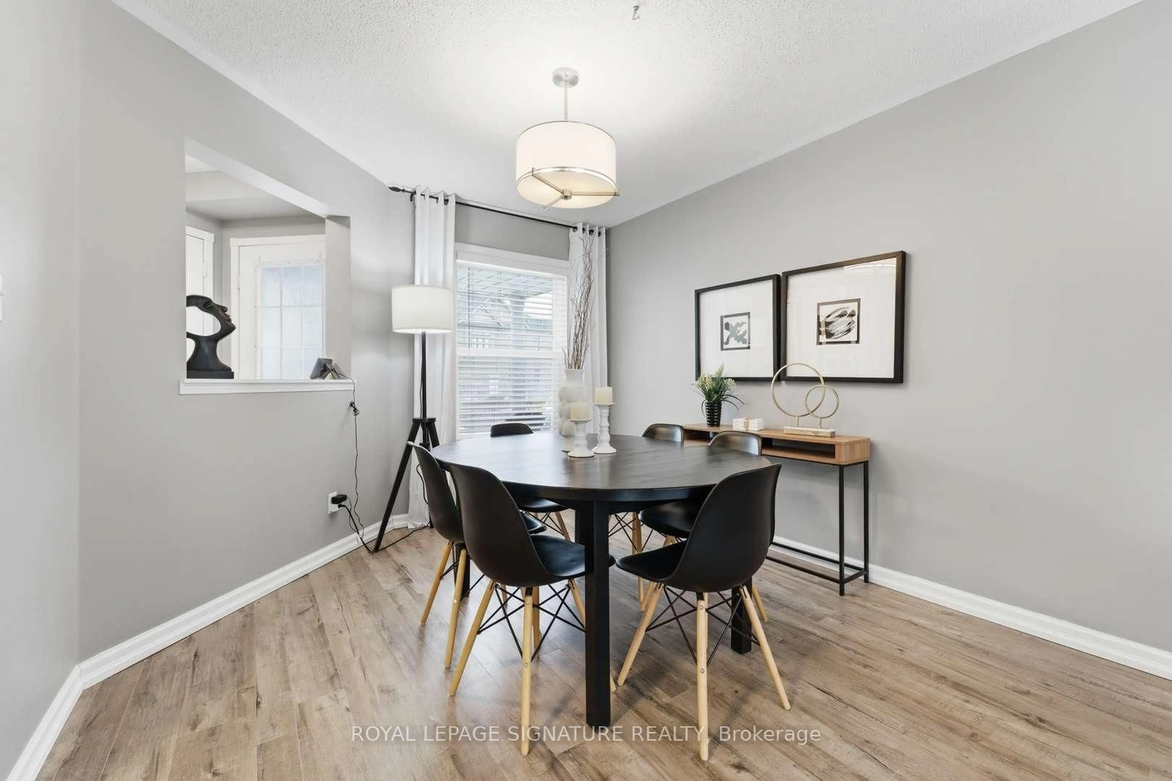 Dining room, wood/laminate floor for 52 Seaboard Gate, Whitby Ontario L1N 9P2