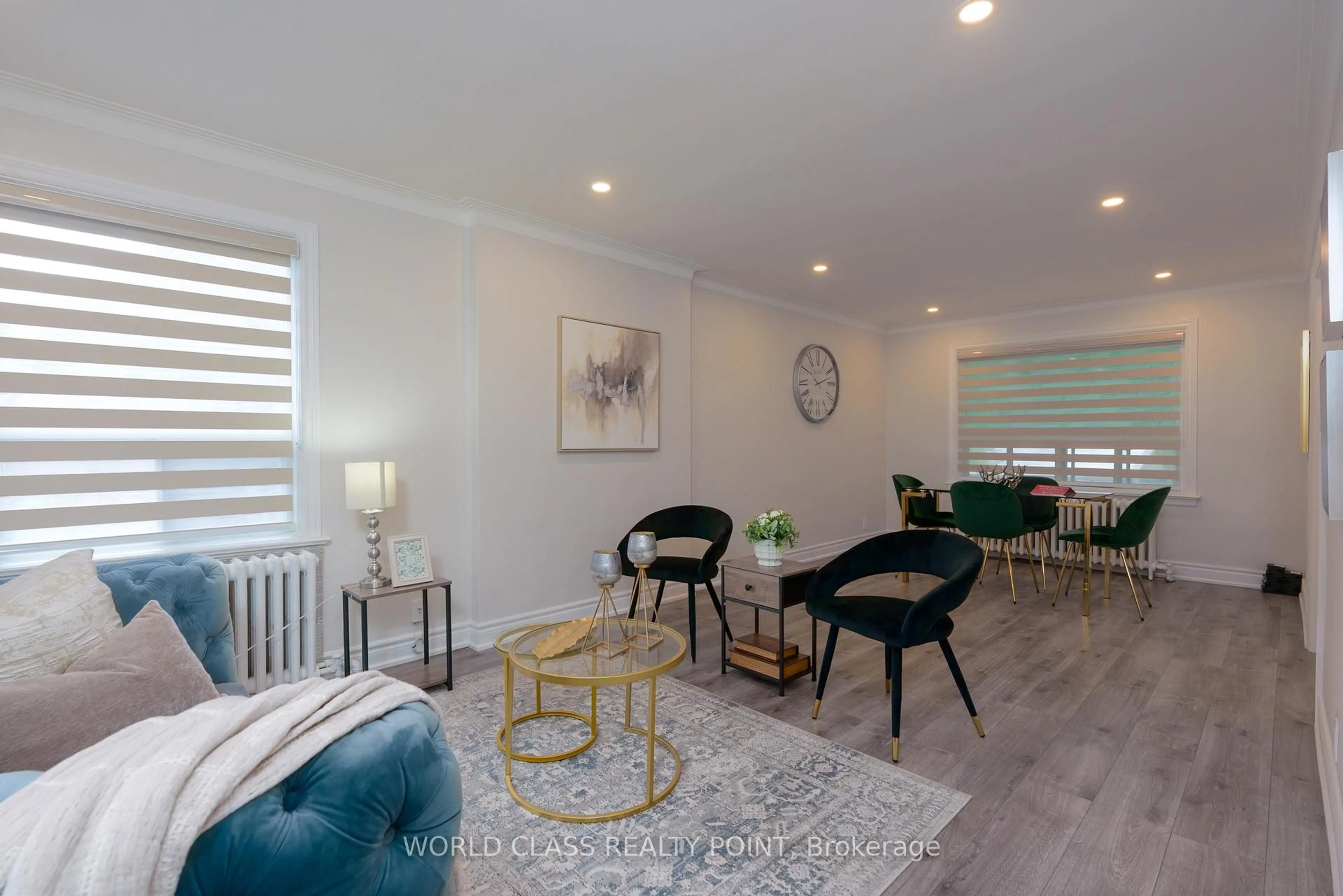 Living room with furniture, wood/laminate floor for 152 Ferris Rd, Toronto Ontario M4B 1G9