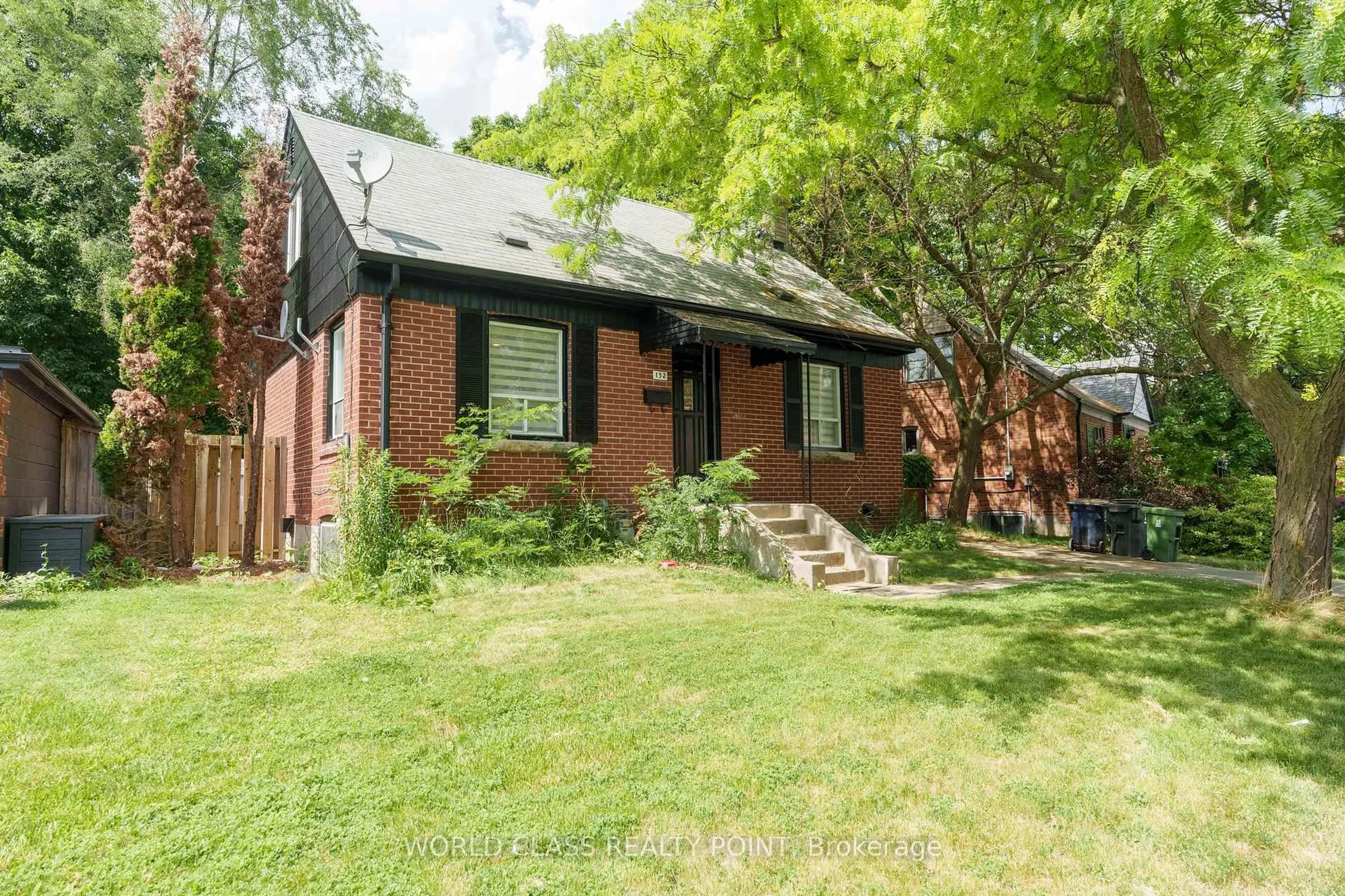 Home with brick exterior material, street for 152 Ferris Rd, Toronto Ontario M4B 1G9