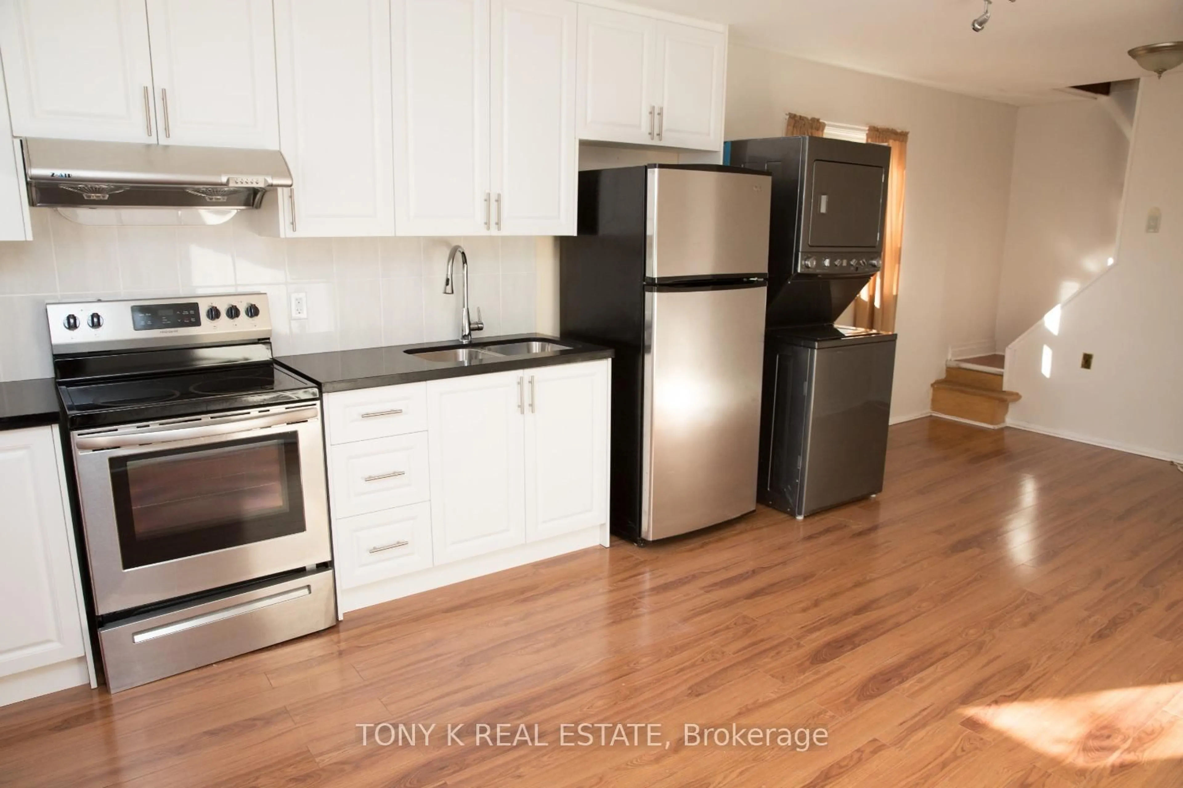 Standard kitchen, wood/laminate floor for 67 Mcdonald Ave, Toronto Ontario M1L 3Y7