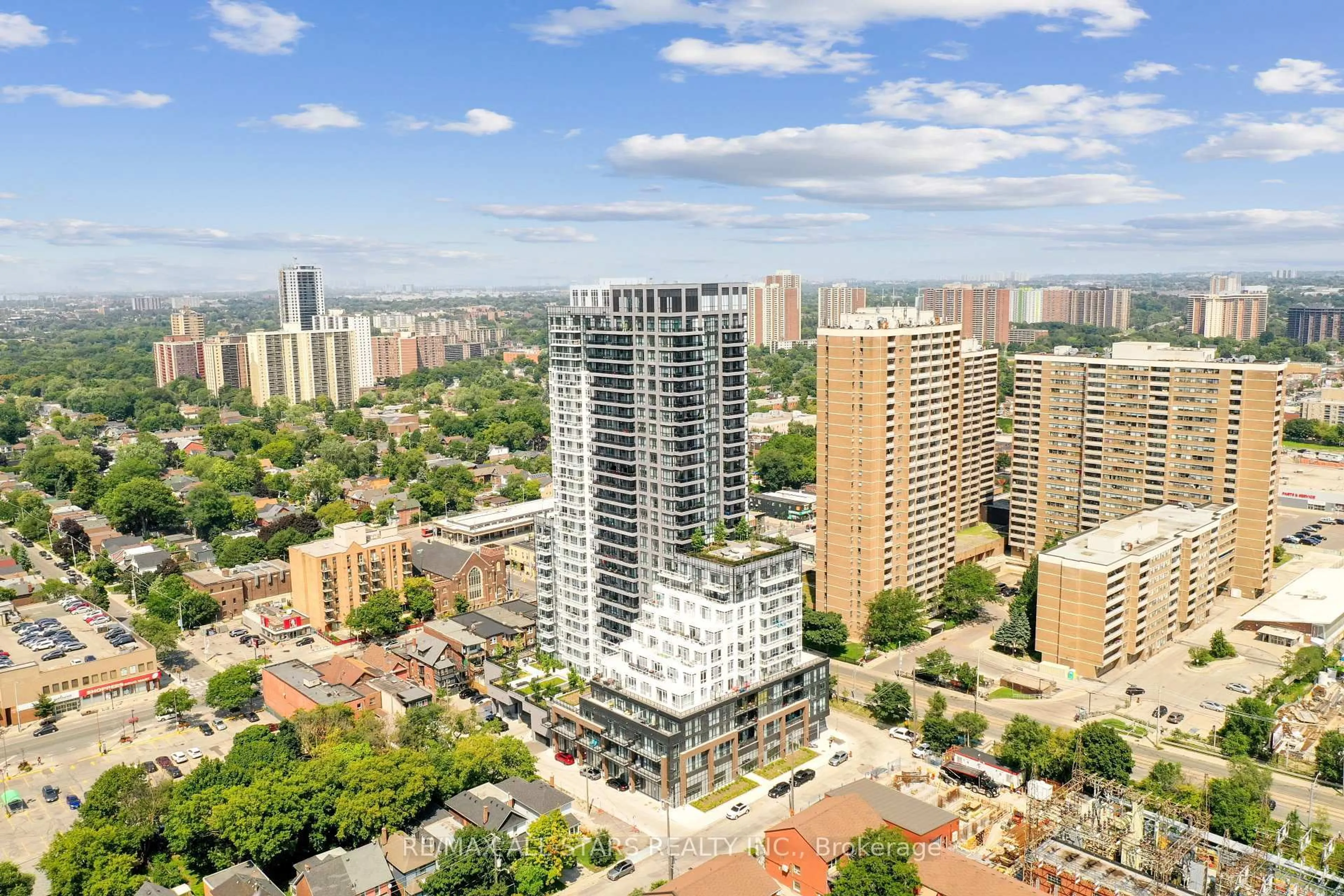 A pic from outside/outdoor area/front of a property/back of a property/a pic from drone, city buildings view from balcony for 286 Main St #2310, Toronto Ontario M4C 0B3