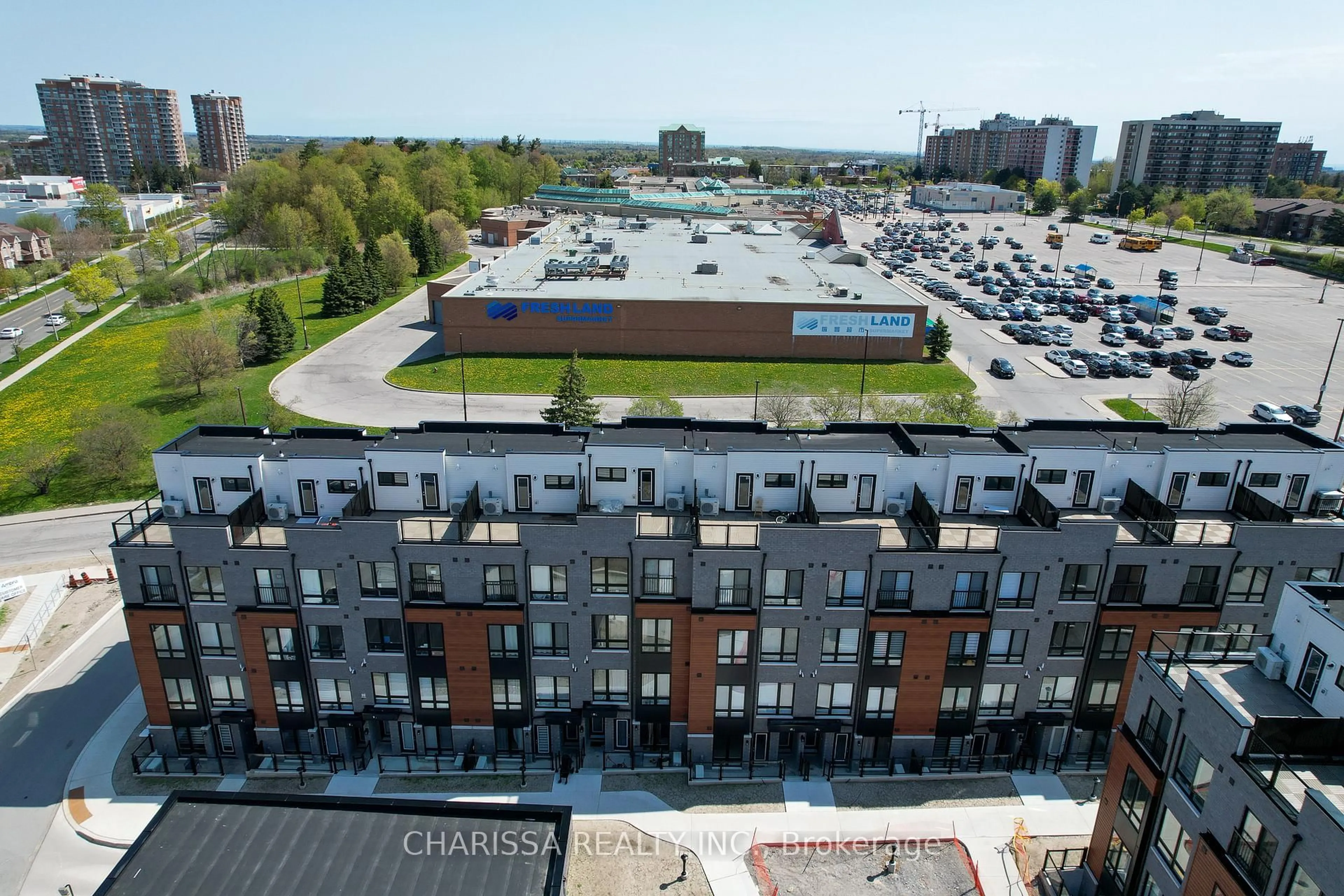 A pic from outside/outdoor area/front of a property/back of a property/a pic from drone, city buildings view from balcony for 30 Liben Way #33, Toronto Ontario M1J 3Z4