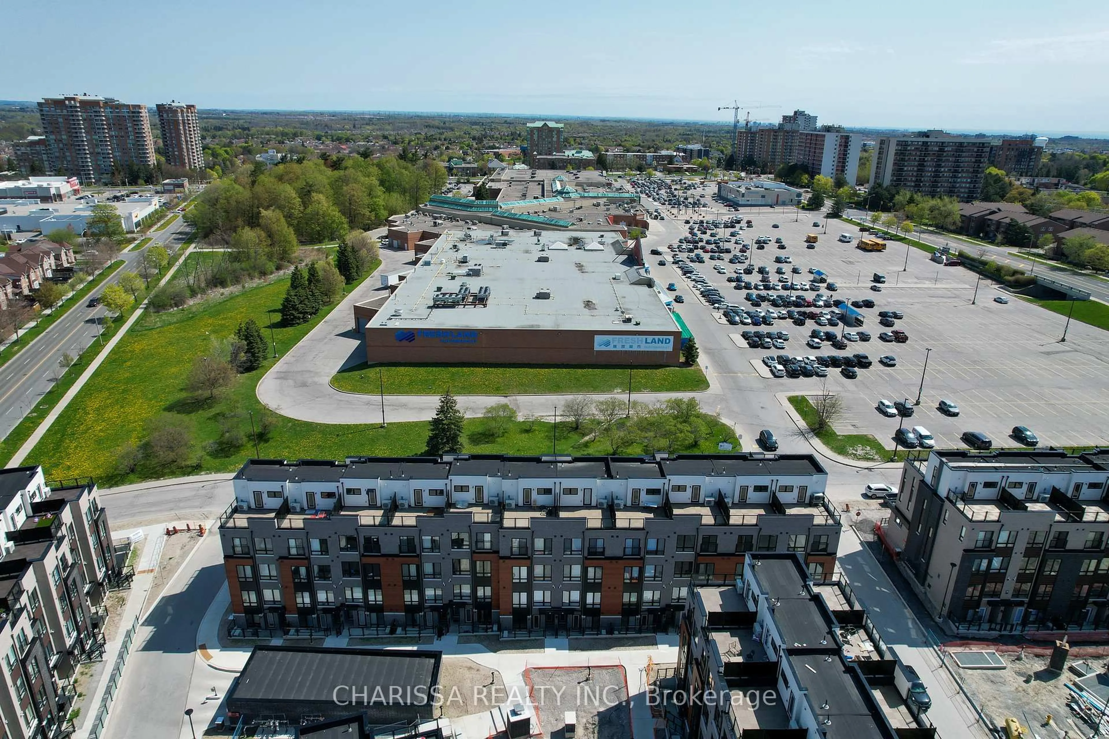 A pic from outside/outdoor area/front of a property/back of a property/a pic from drone, city buildings view from balcony for 30 Liben Way #9, Toronto Ontario M1J 3Z4