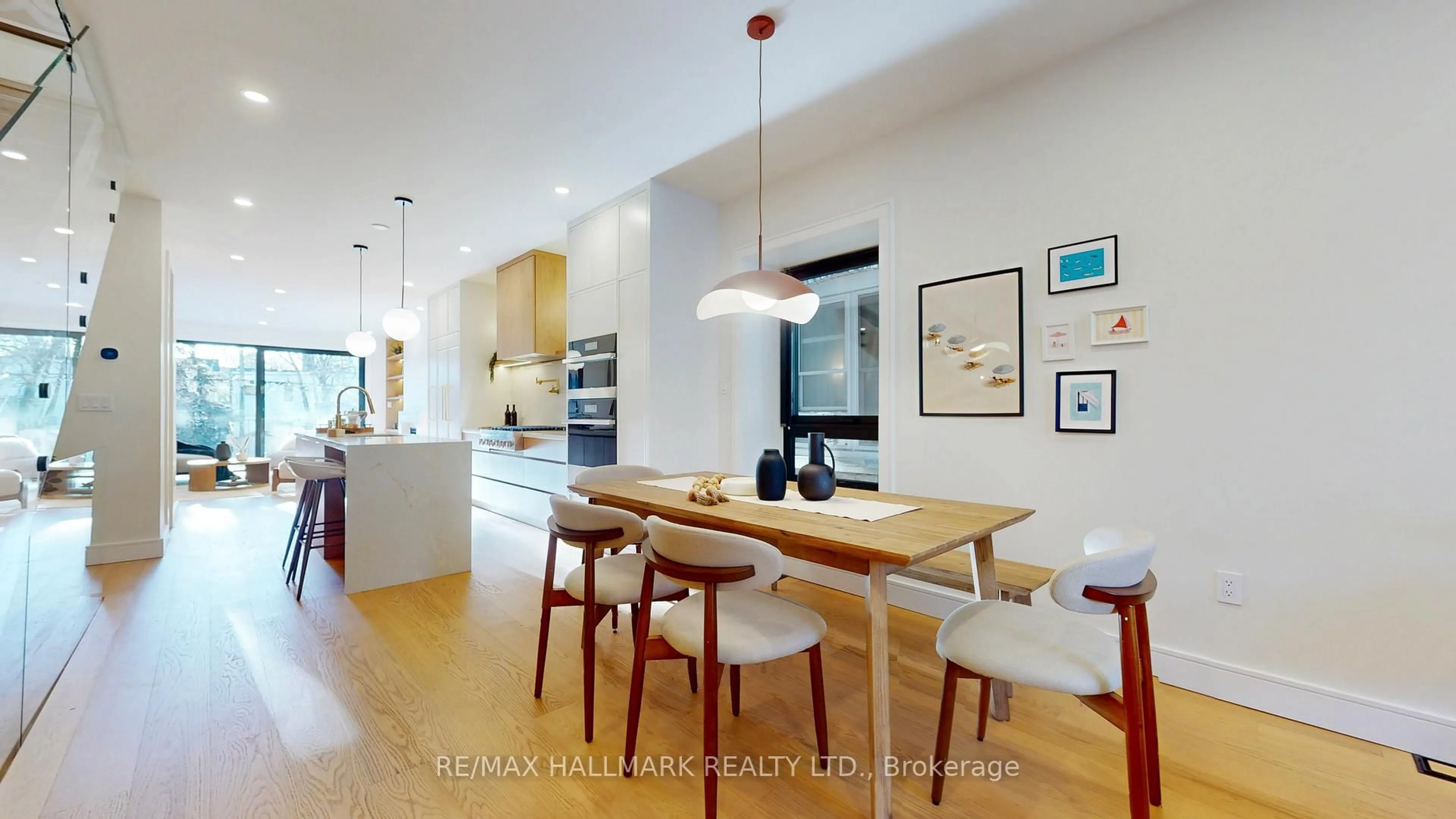 Open concept kitchen, wood/laminate floor for 290 Waverley Rd, Toronto Ontario M4L 3T6