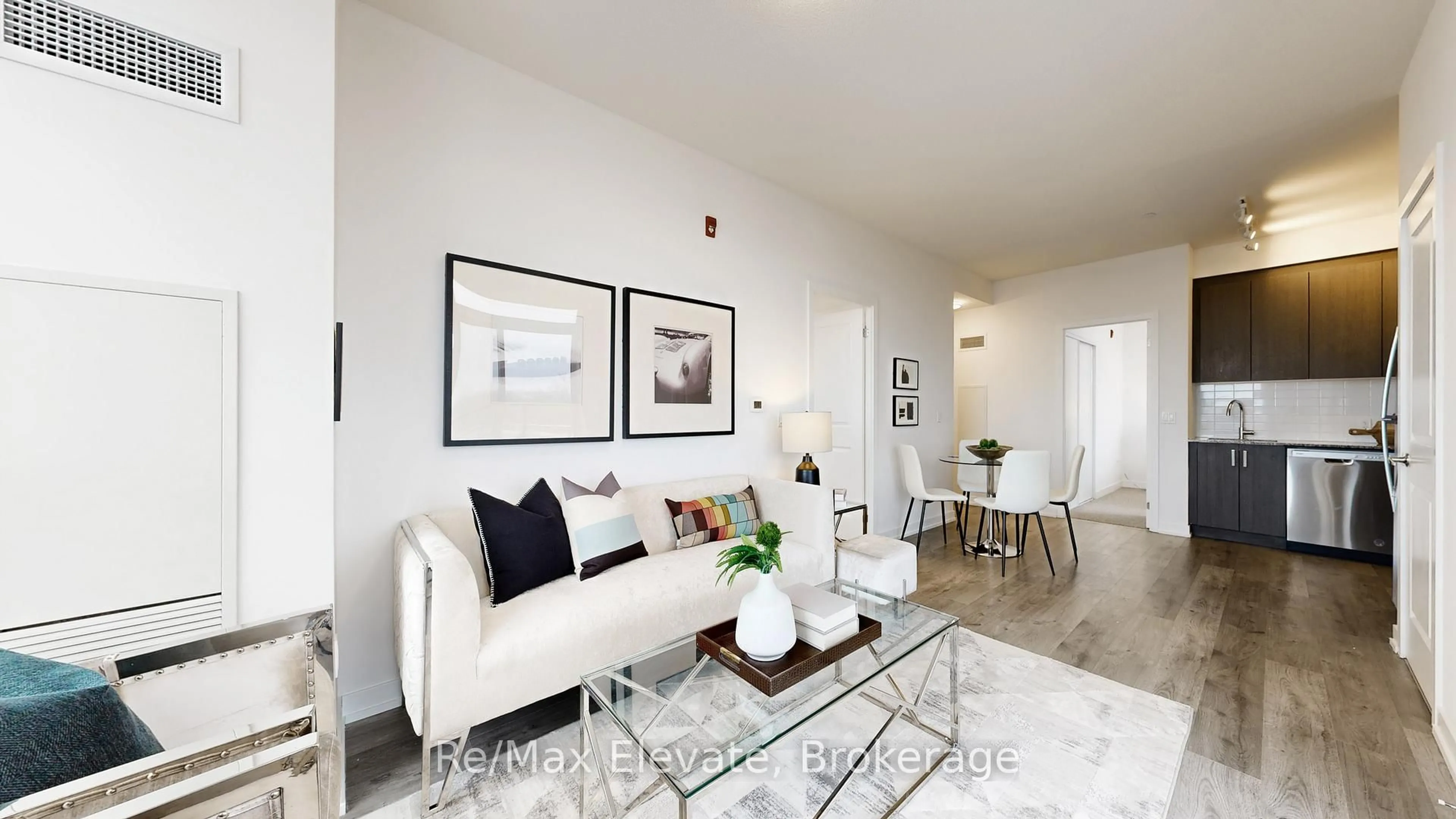 Living room with furniture, unknown for 1010 Dundas St #519, Whitby Ontario L1N 2K2