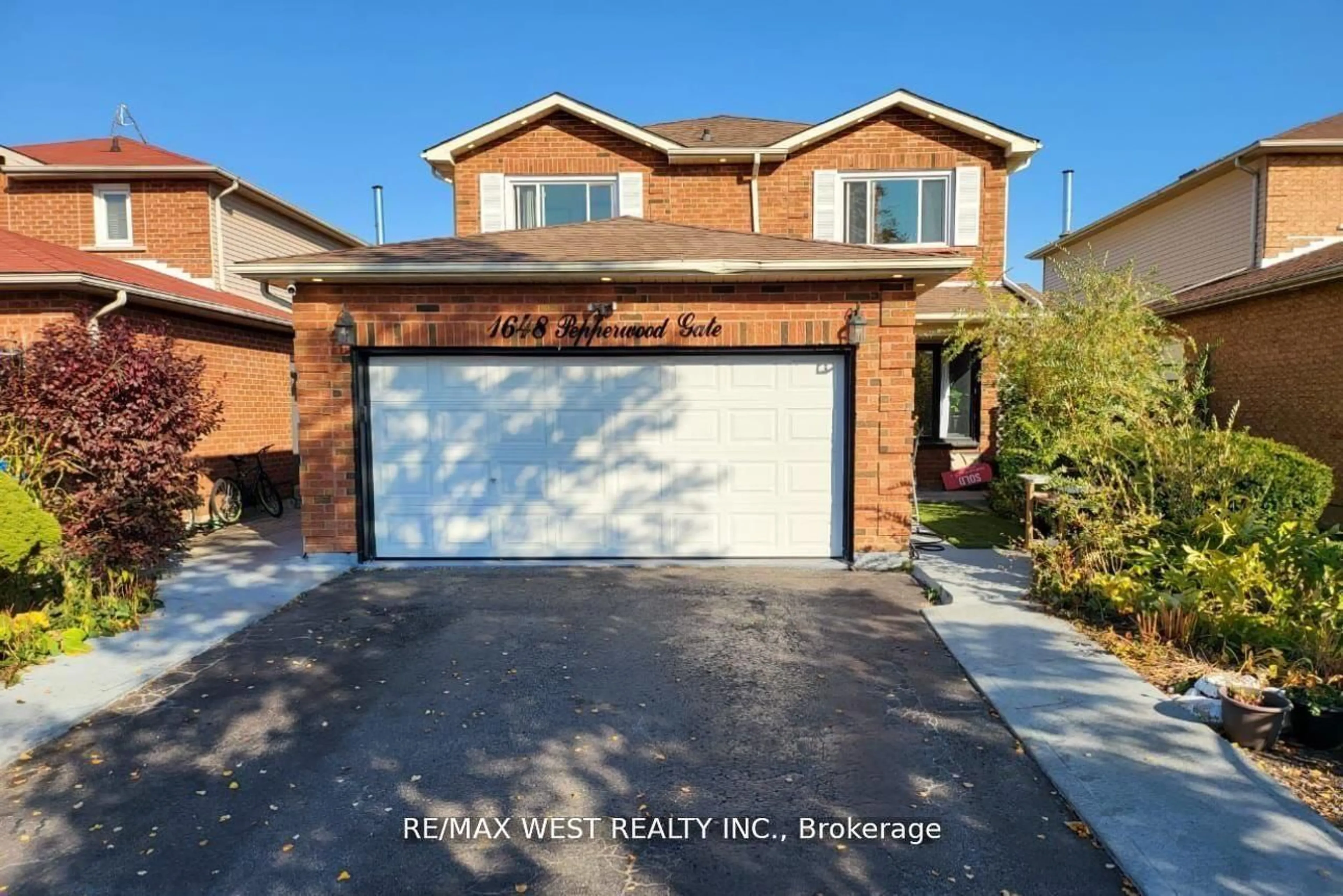 Home with brick exterior material, street for 1648 Pepperwood Gate, Pickering Ontario L1X 2K3