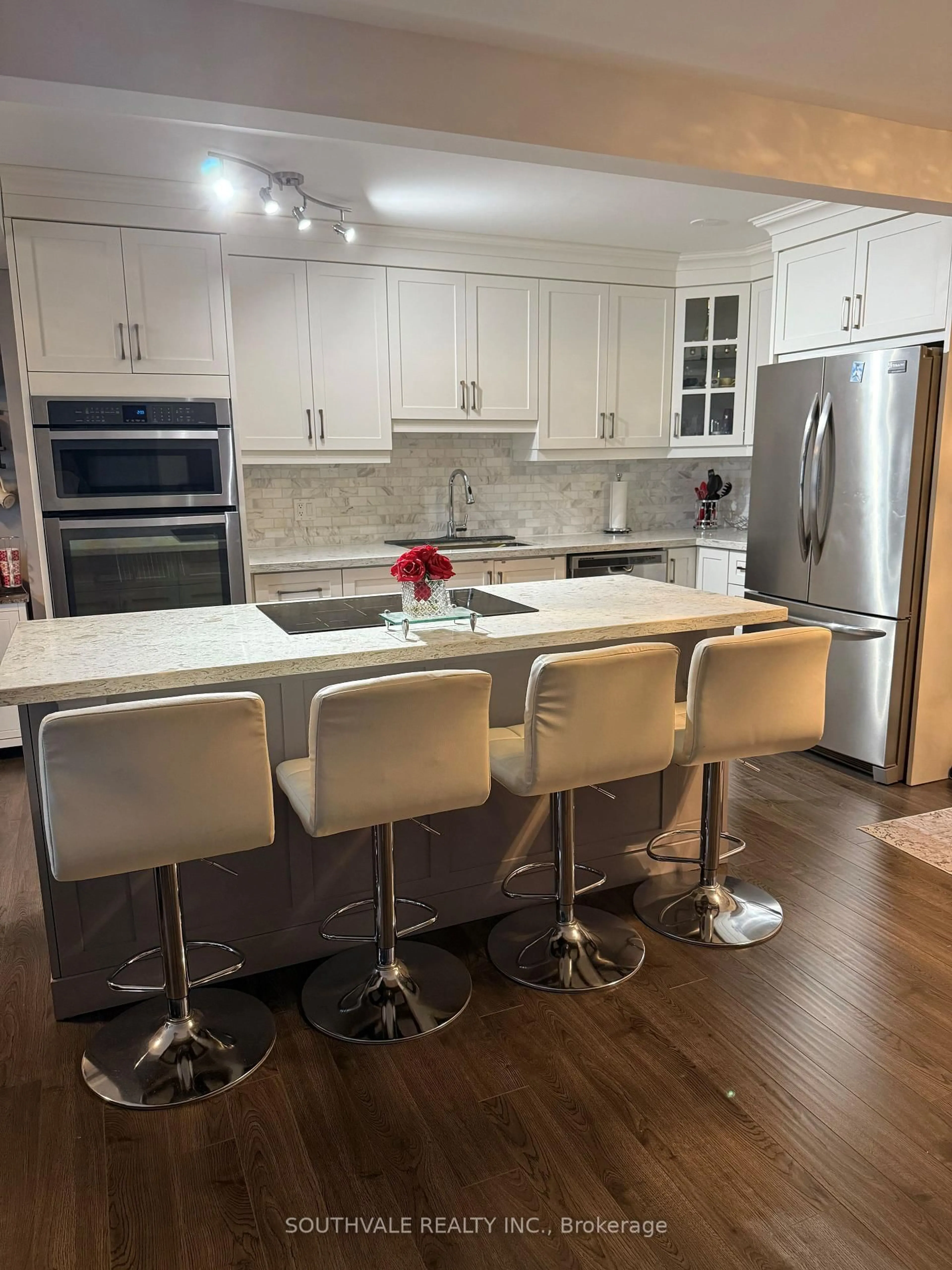 Open concept kitchen, wood/laminate floor for 1210 Radom St #601, Pickering Ontario L1W 2Z3